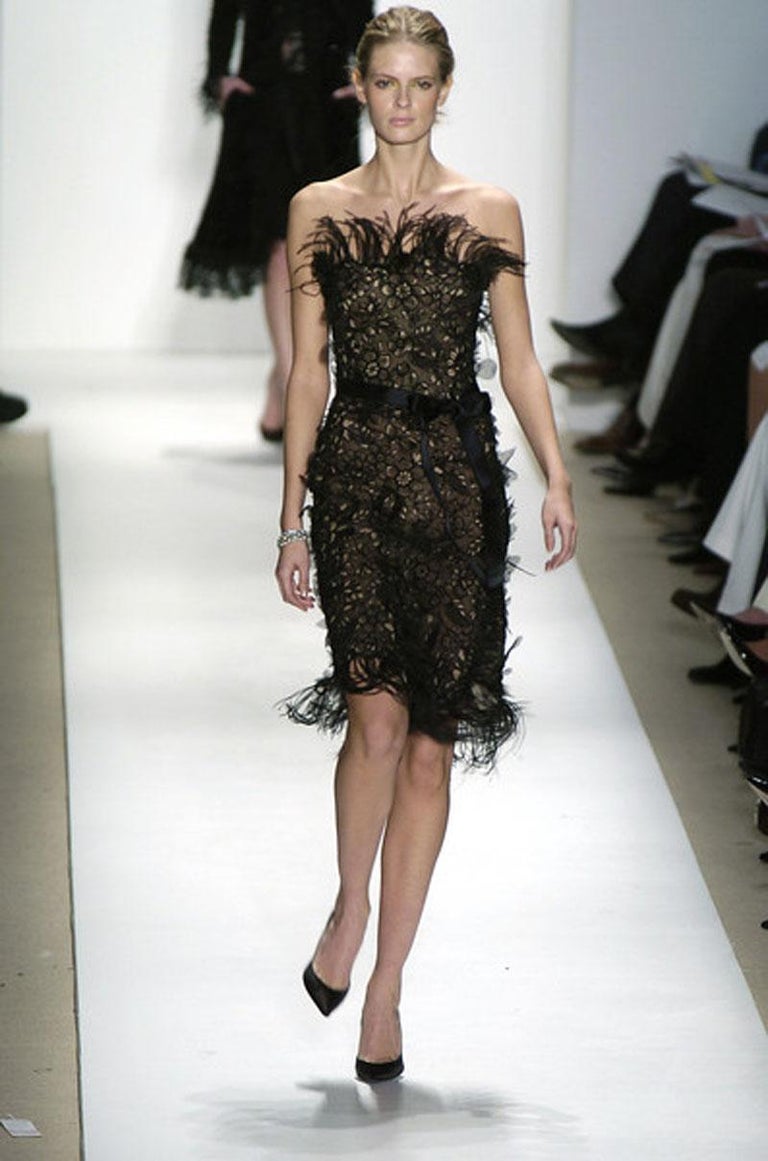 Vintage Oscar de la Renta Black Feather Embellished Cocktail Dress
F/W 2004 Runway Collection
USA size - 6
Black flowers laser-cut tulle finished with 3-D petals application and beads. Double lined in nude color tulle and silk. Real Ostrich