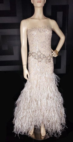 OSCAR DE LA RENTA FEATHER and SEQUIN EMBELLISHED NUDE TULLE GOWN