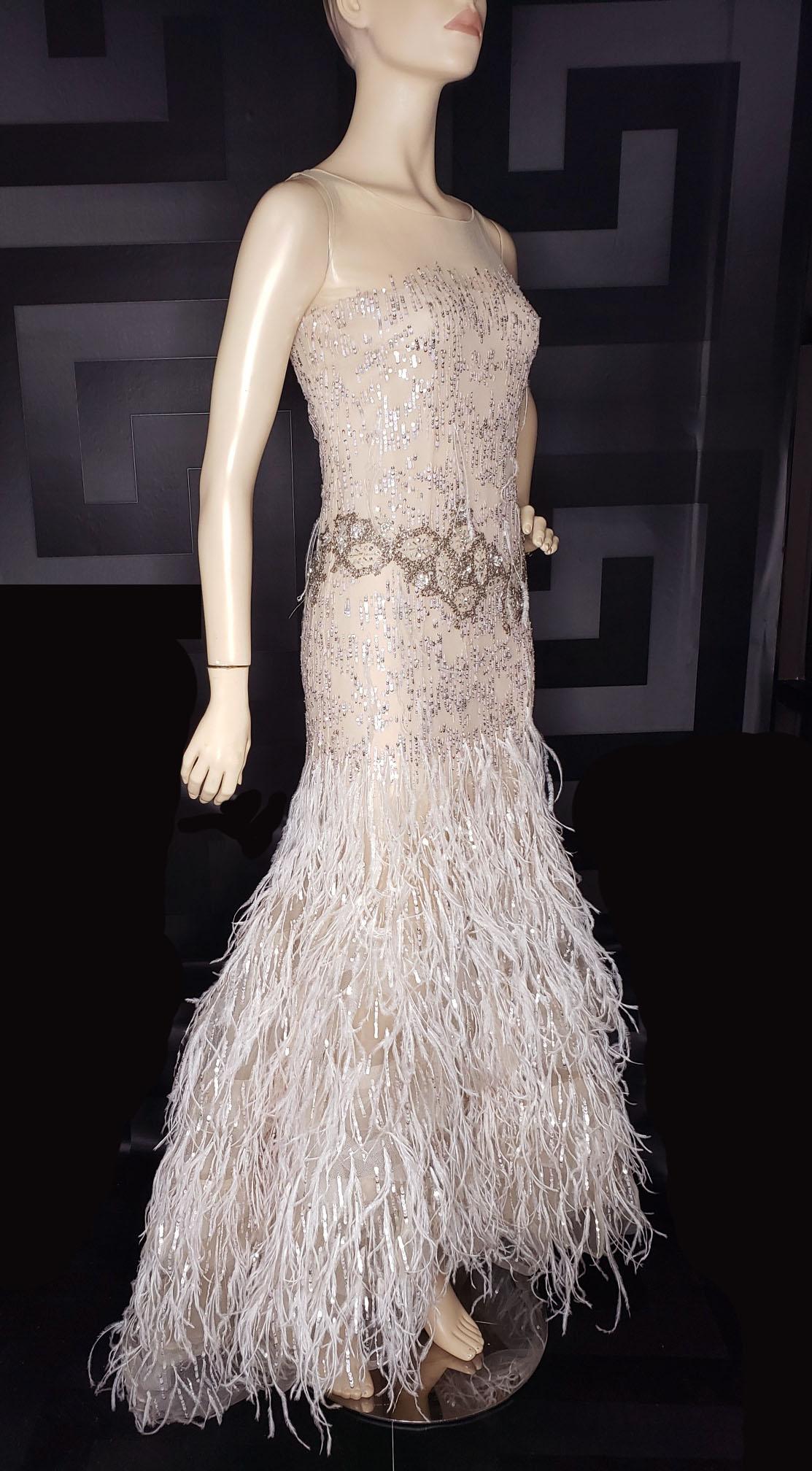 nude dress with feathers
