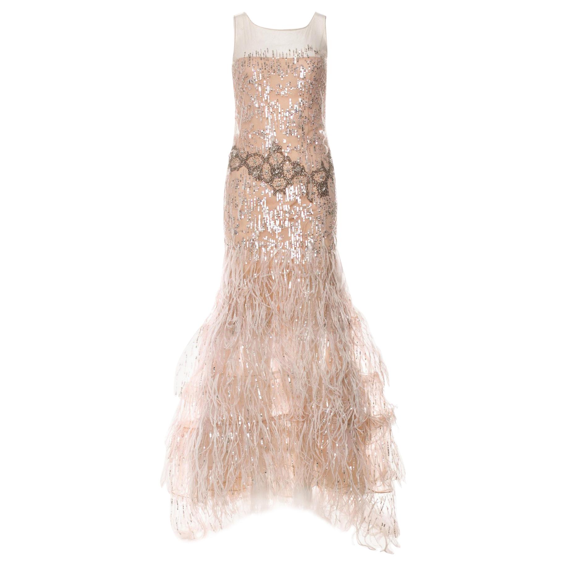 OSCAR DE LA RENTA FEATHER and SEQUIN EMBELLISHED NUDE TULLE GOWN