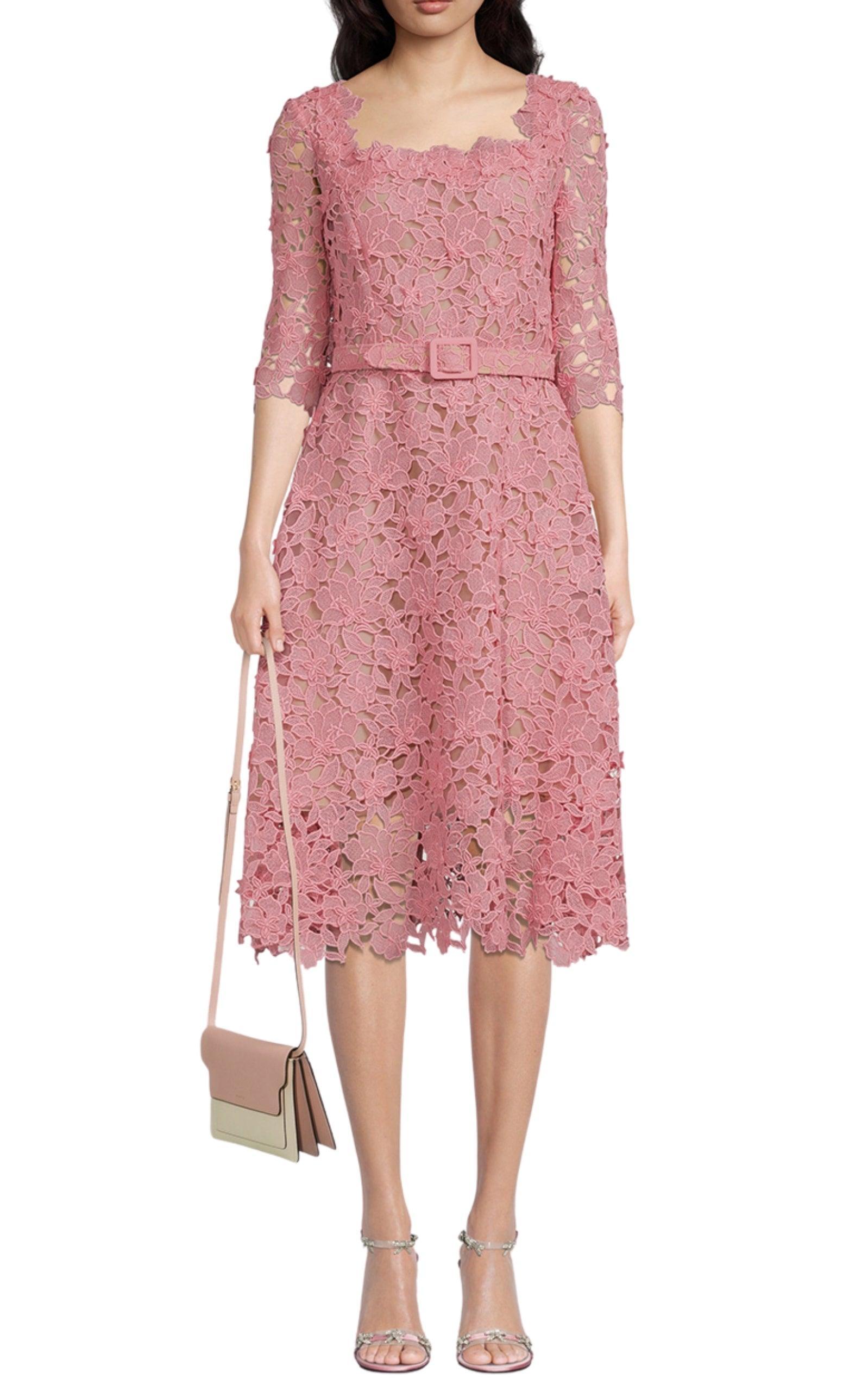 This sophisticated midi dress from Oscar de la Renta is made from guipure lace and lined with organza and crêpe de chine. It has a square neckline, elbow-length sleeves and a midi hem.
Square neckline
Three-quarter sleeve
Belted waist 
Concealed