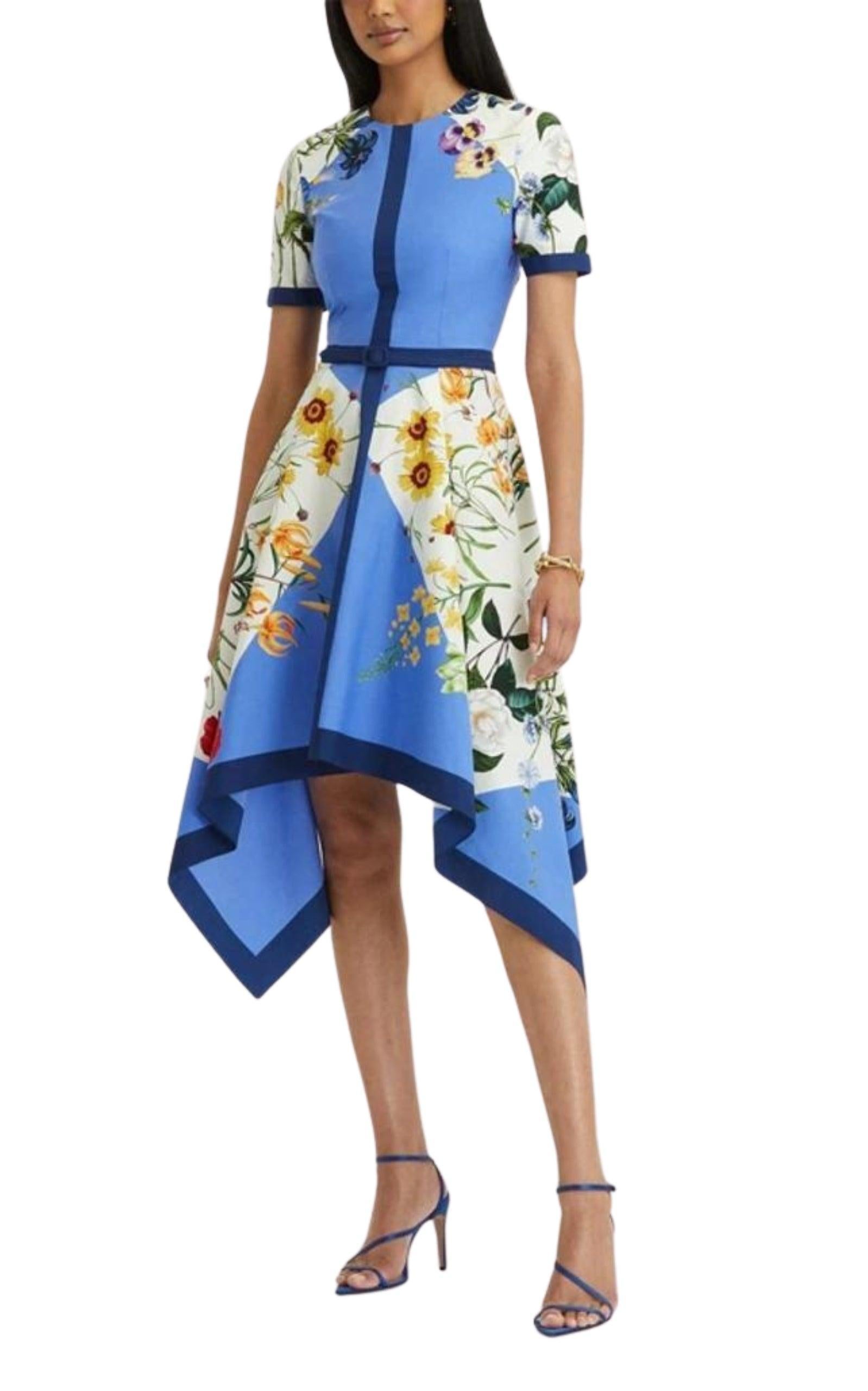 Colorway blue multi cotton
A vibrant take on cocktail wear, this Oscar de la Renta flared dress is decorated with blossoming flowers and contrasting panels. 
It features a flowy handkerchief hem that adds to the piece's whimsical feel
Cotton 97%,