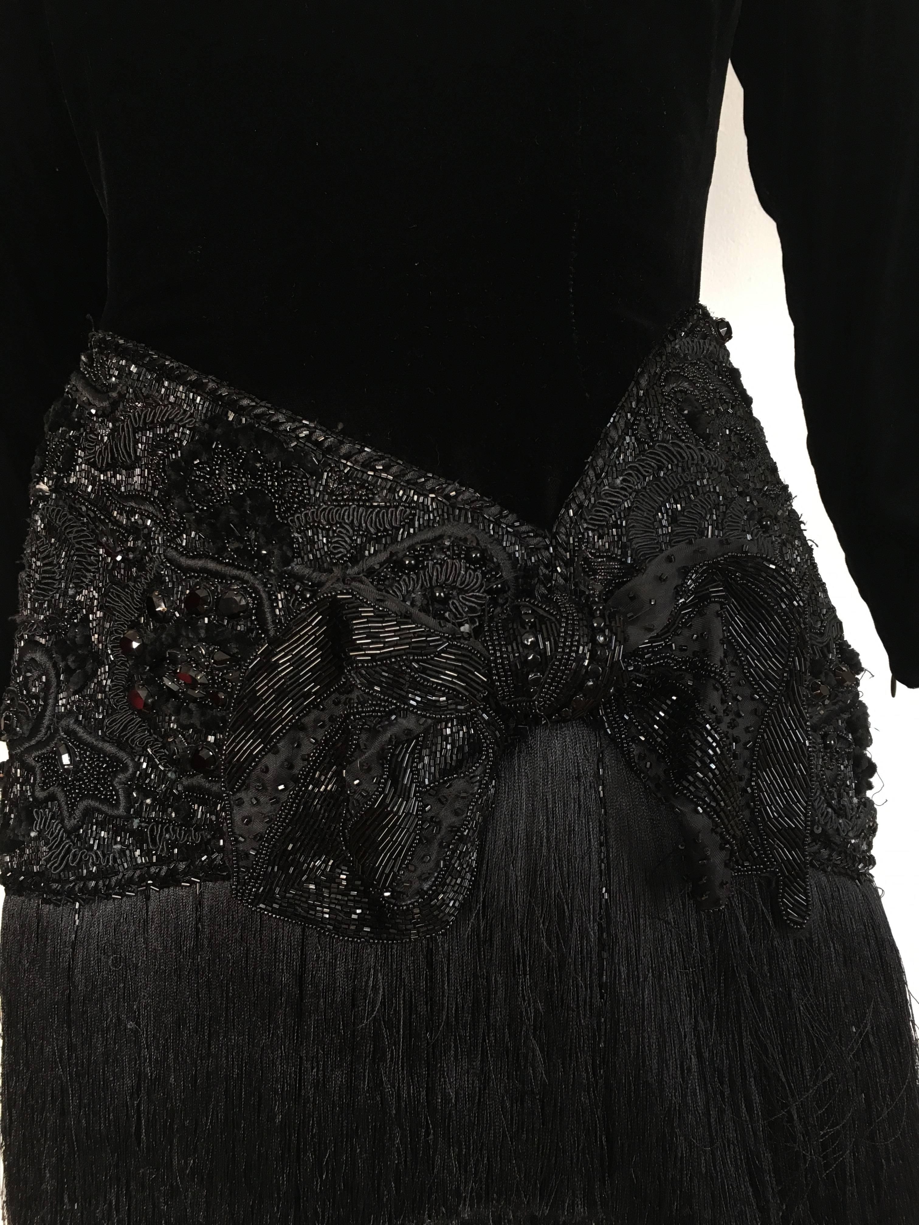 Oscar de la Renta for Saks Fifth Avenue black velvet beaded & fringe evening cocktail dress is a size 6.  Ladies please grab your most trusted friend, Mr. Tape Measure, so you can measure your bust, waist & hips to make certain this dress is exactly