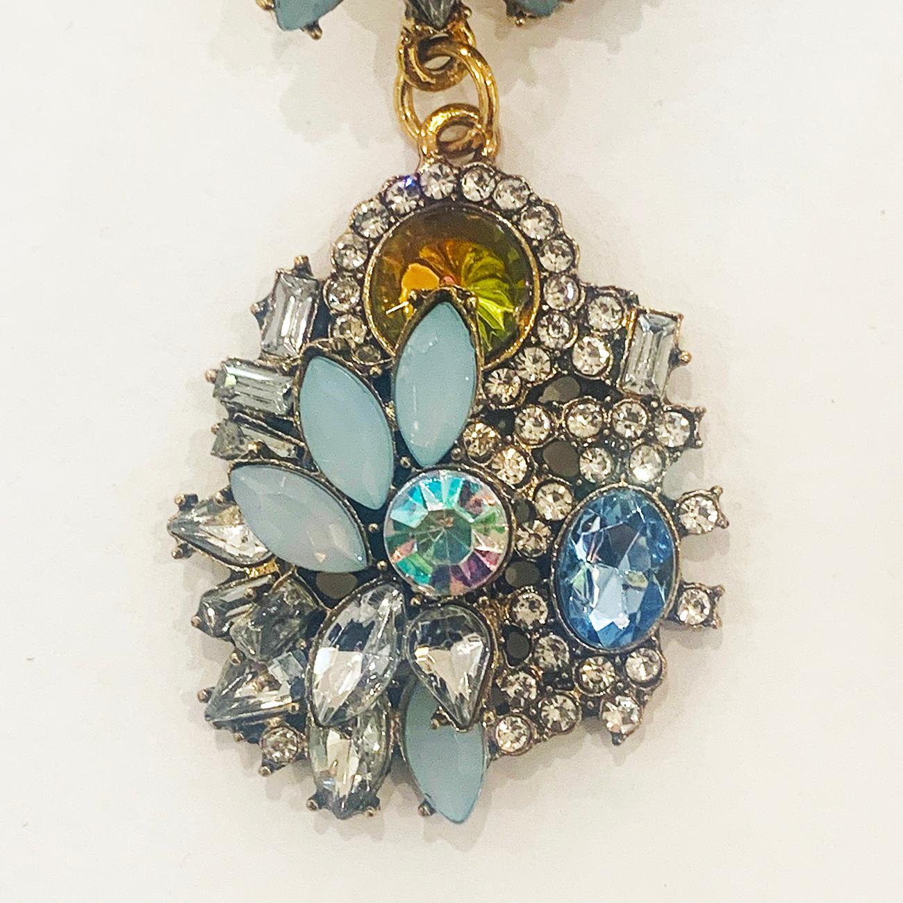 Genuine Oscar De La Renta Earrings, design “Garden Party”, in soft blue tones, and a “Rainbow” Diamante with multiple different shaped crystal diamantes, all facetted, in various shapes and many different sizes. All in excellent condition with no