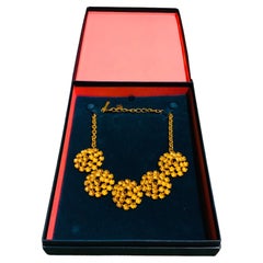 Oscar De La Renta, collier de fleurs en plaqué or 