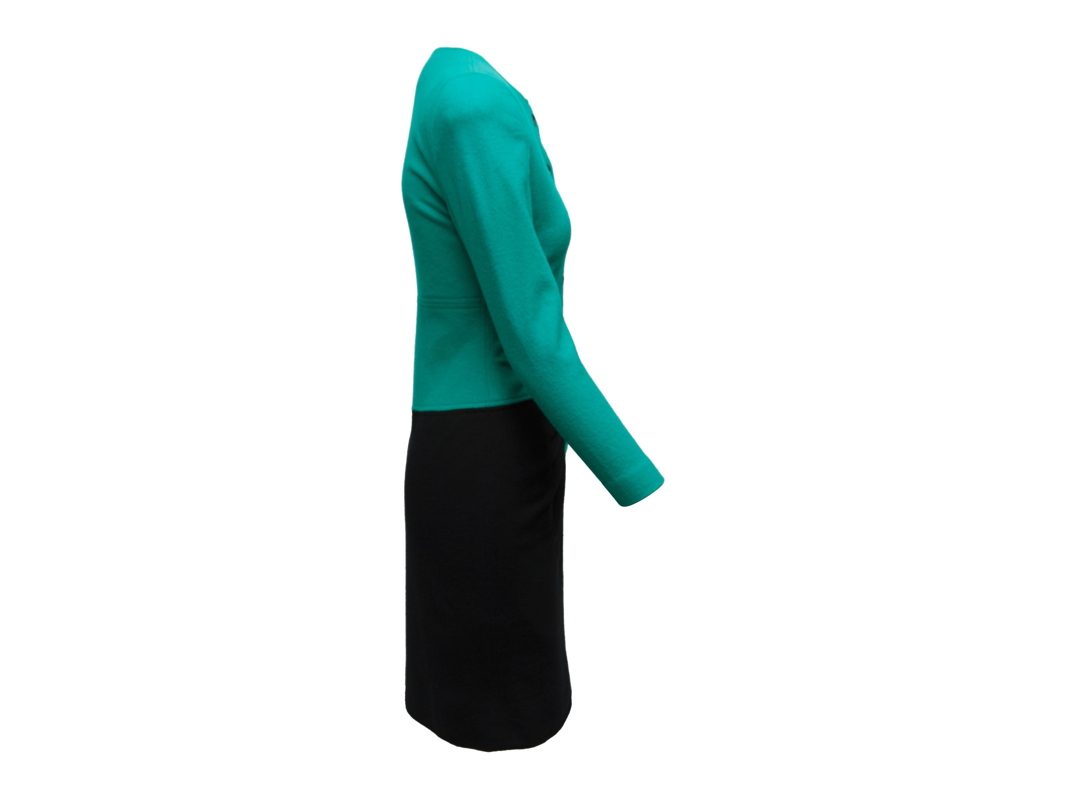 Product details: Vintage green and black color block dress by Oscar de la Renta. Circa 1980s. Crew neck. Long sleeves. Button closures at front. 32