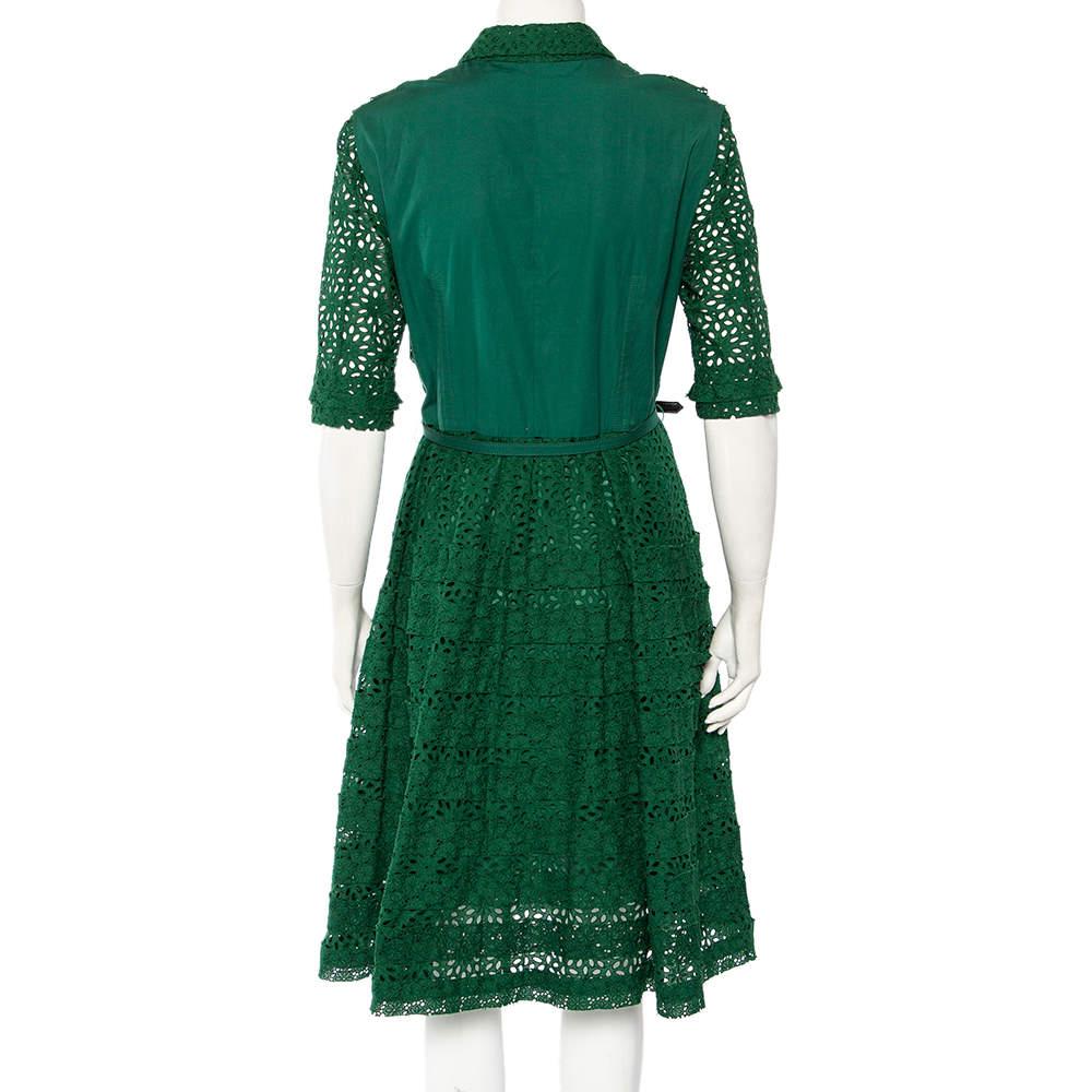 Oscar de la Renta has a chic and feminine spirit that is translated effortlessly in this dress. It has been skillfully made from dainty lace and features a belted waist. Style this number with high heels and a box clutch.

Includes: Belt
