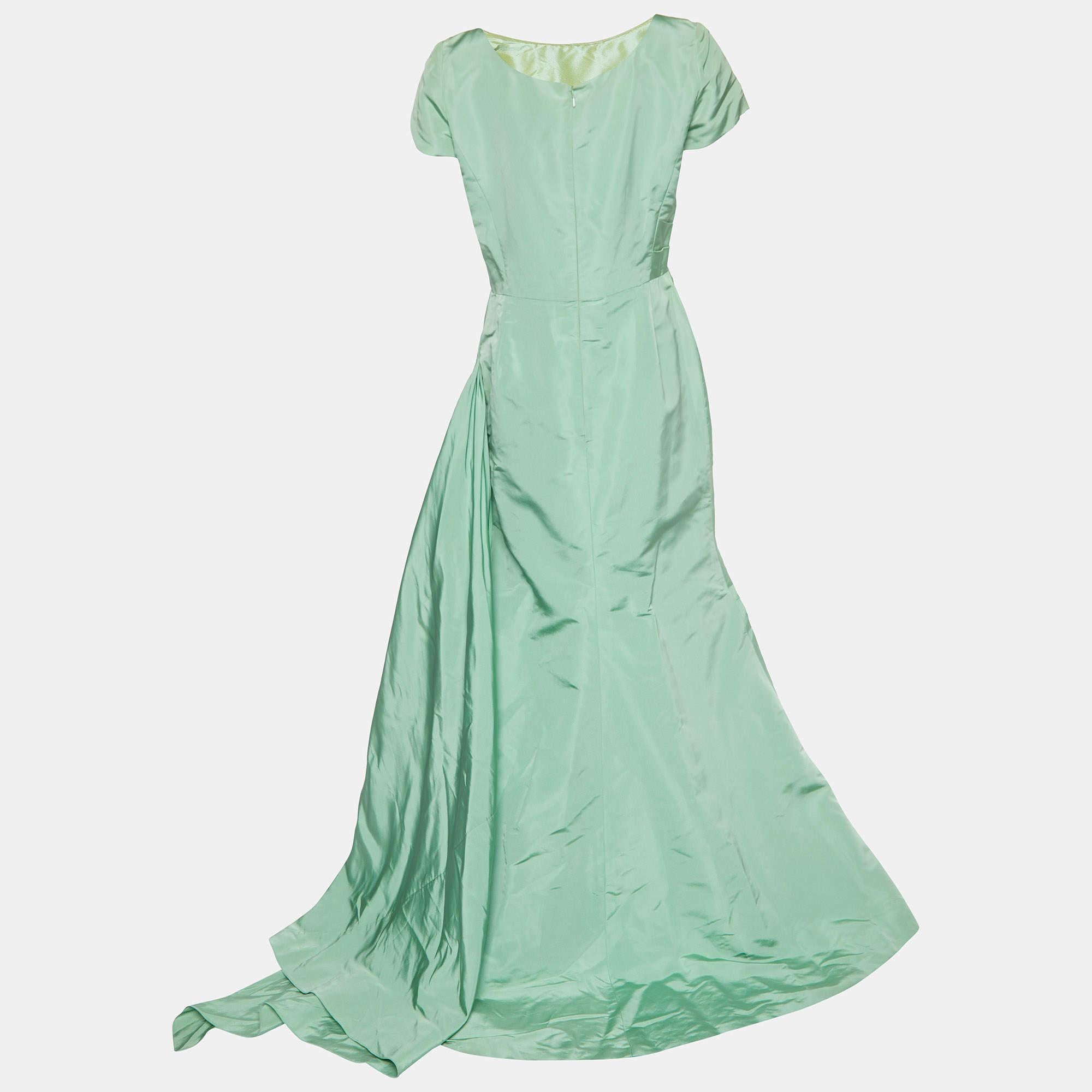 Resplendent elegant and gorgeous this gown defines it all. Flaunting a floor length silhouette this gown is beautified using stunning details and a stylish neckline. Wear it with statement accessories and a defining clutch.