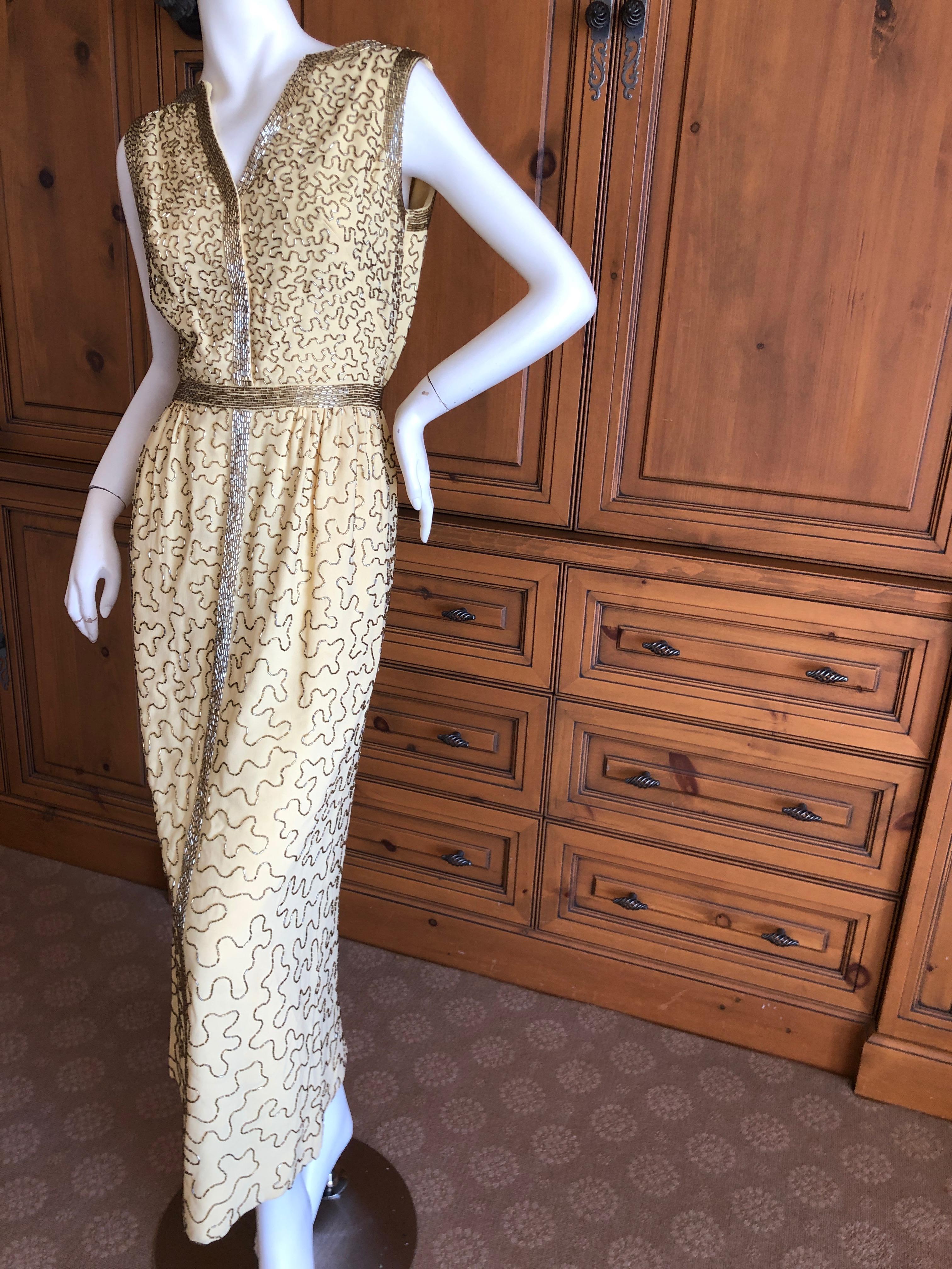 Oscar de la Renta Heavily Embellished Yellow Vintage 70's  Evening Dress 
Simply Stunning. Please use the zoom feature to see al the remarkable details.
There is no size tag
Appx Size 6-8
Bust 38