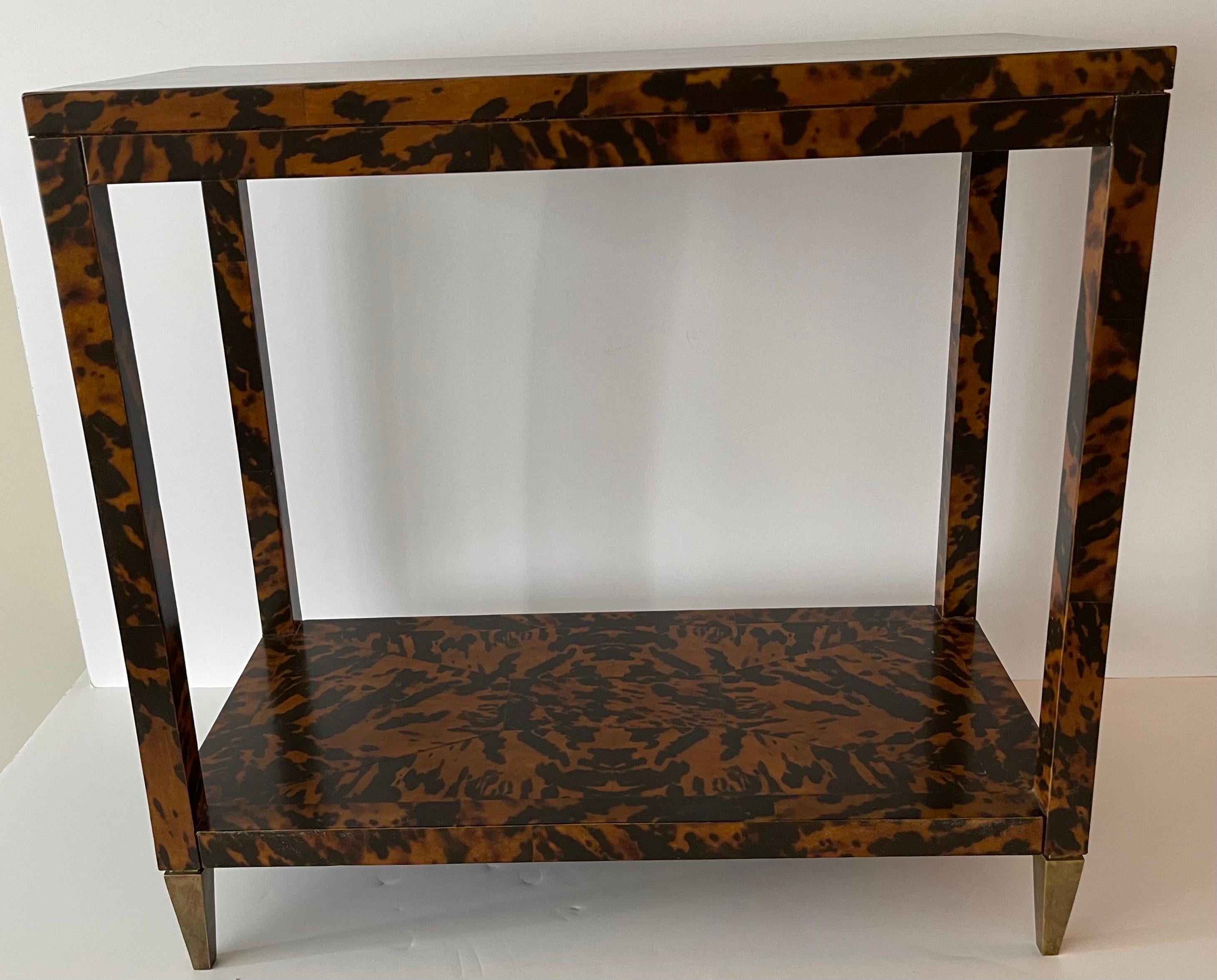 Oscar de la Renta Home by Century Furniture Co. faux tortoise side table. Two tier design with faux tortoise veneer and brass capped feet. Signed on the underside.
