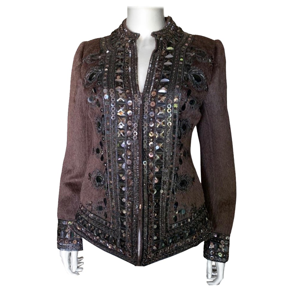 One of the most beautiful and luxe pieces by designer Oscar de la Renta that we have ever had. From the Fall 2006 Collection, NYC. Purchased at Neiman Marcus (double label) this is a very high end piece. (Retailed over $6,000). Heavily hand