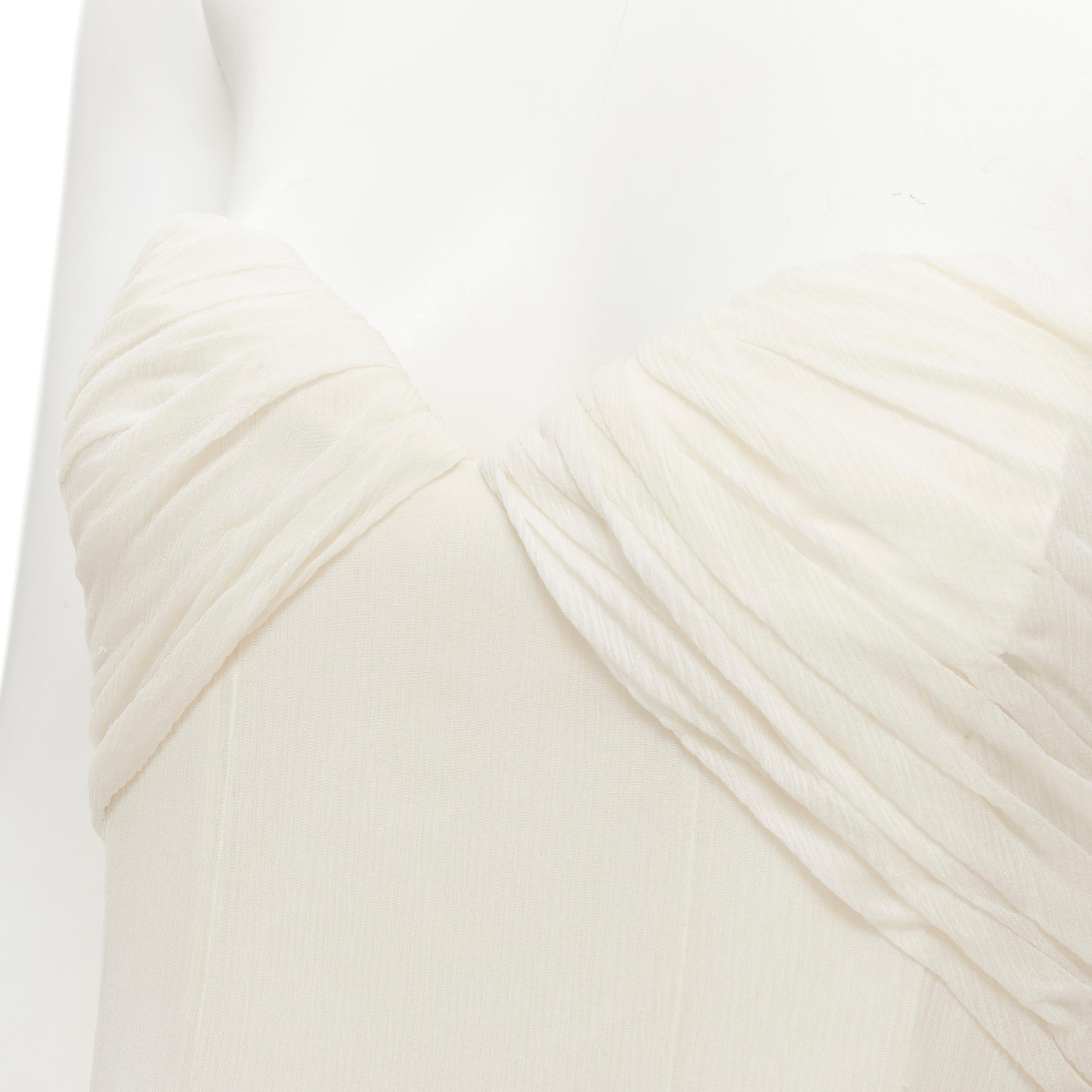 OSCAR DE LA RENTA ivory white boned corset strapless evening gown dress US0 XS Reference: LNKO/A01847 
Brand: Oscar De La Renta 
Designer: Oscar De La Renta 
Material: Silk 
Color: White 
Pattern: Solid 
Closure: Zip 
Extra Detail: Boned corset