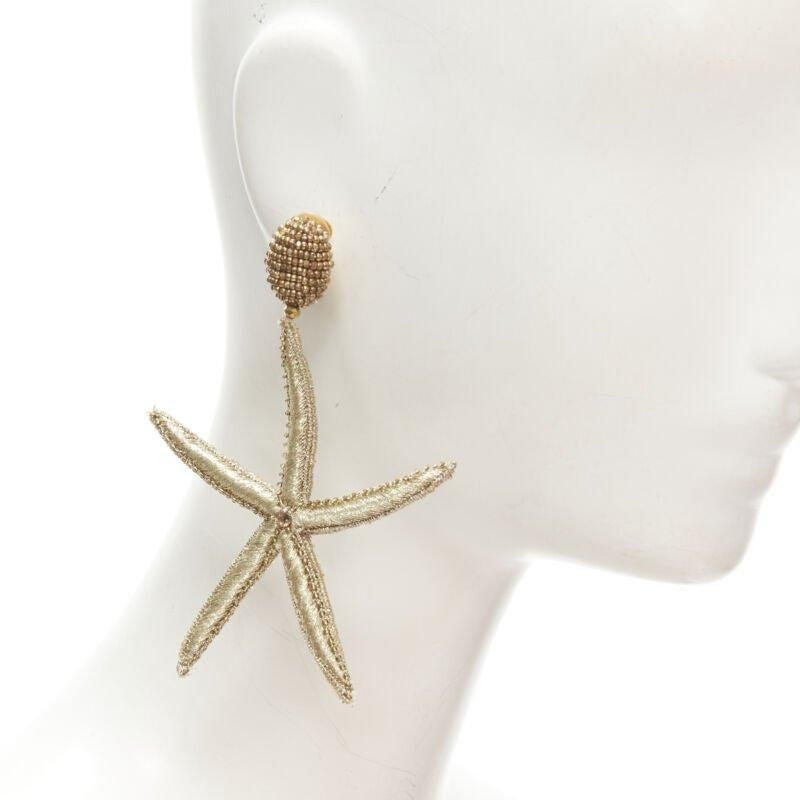 OSCAR DE LA RENTA Large Starfish gold bead embellished clip on earrings
Reference: TGAS/C01150
Brand: Oscar de la Renta
Material: Fabric
Color: Gold
Pattern: Solid
Closure: Clip On
Extra Details: Fabric Large Starfish with bead embellishment. Clip