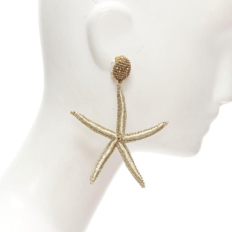 Women's OSCAR DE LA RENTA Large Starfish gold bead embellished clip on earrings For Sale