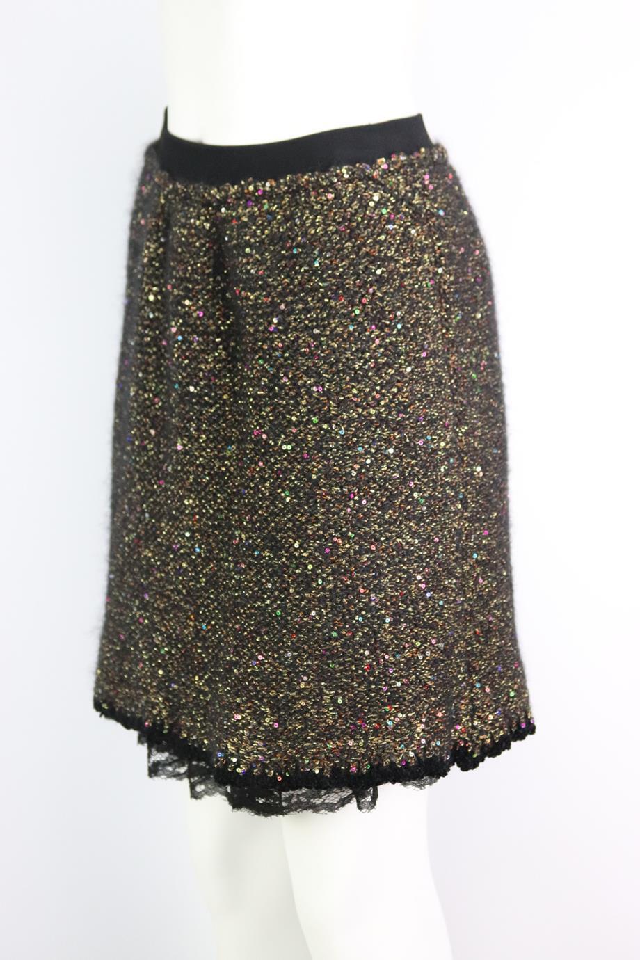 Oscar de La Renta metallic knitted skirt. Made from gold and black sequin embellished knitted fabric with lace lining. Gold and black. Pull on. 42% Viscose, 21% polyester, 14% mohair, 12% polyamide, 2% metallized polyester. Size: Medium (UK 10, US