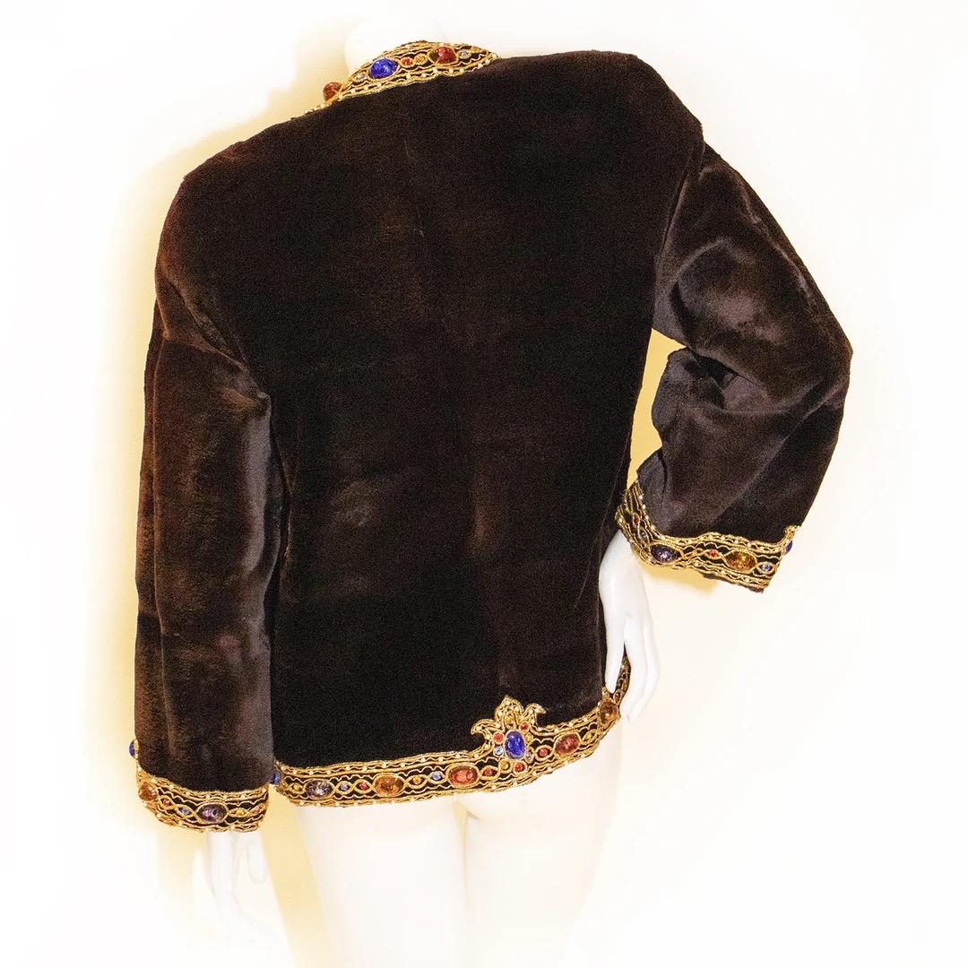 Oscar de la Renta Mink Jacket 
Fall / Winter 1990
Brown 
Shared mink 
Gold embroidery details with costume pearl details 
Multicolor round glass imitation crystal details along trim of jacket and at cuffs of sleeves 
Open style jacket 
Pockets on