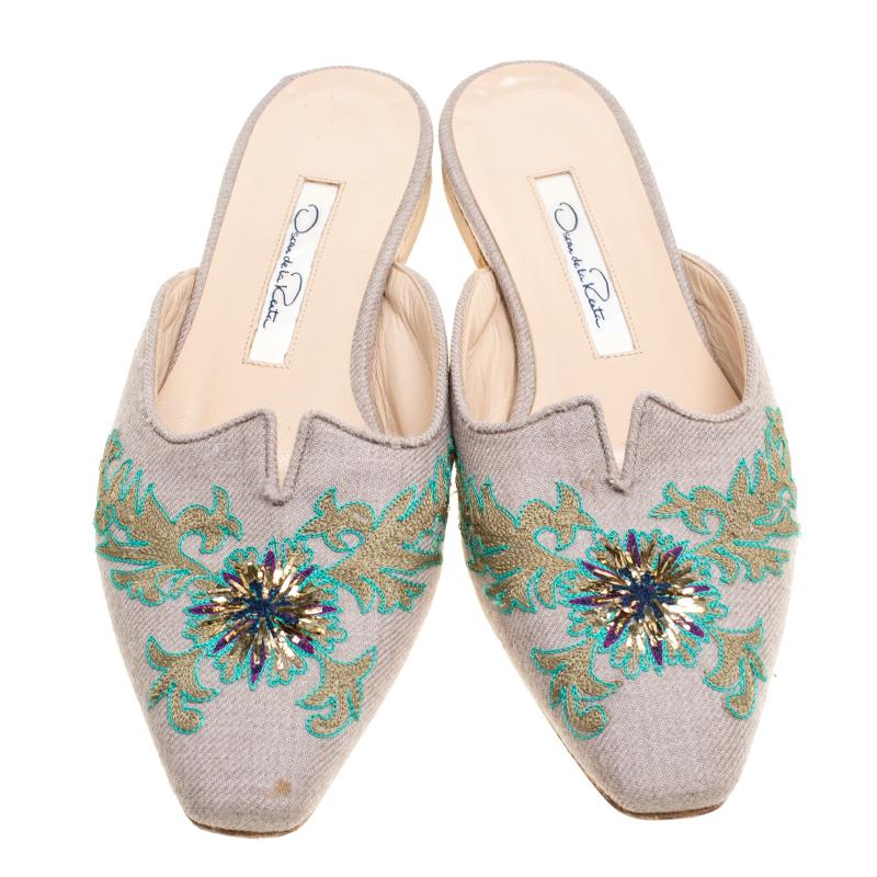 These mules from Oscar de la Renta are exquisite and easy to slip on. They've been crafted from canvas and designed with embroidery and leather insoles meant to provide comfort at every step. This is one pair that speaks high fashion in a nonchalant