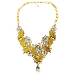 Oscar De La Renta Necklace with gilt leaves and white mirror diamantes