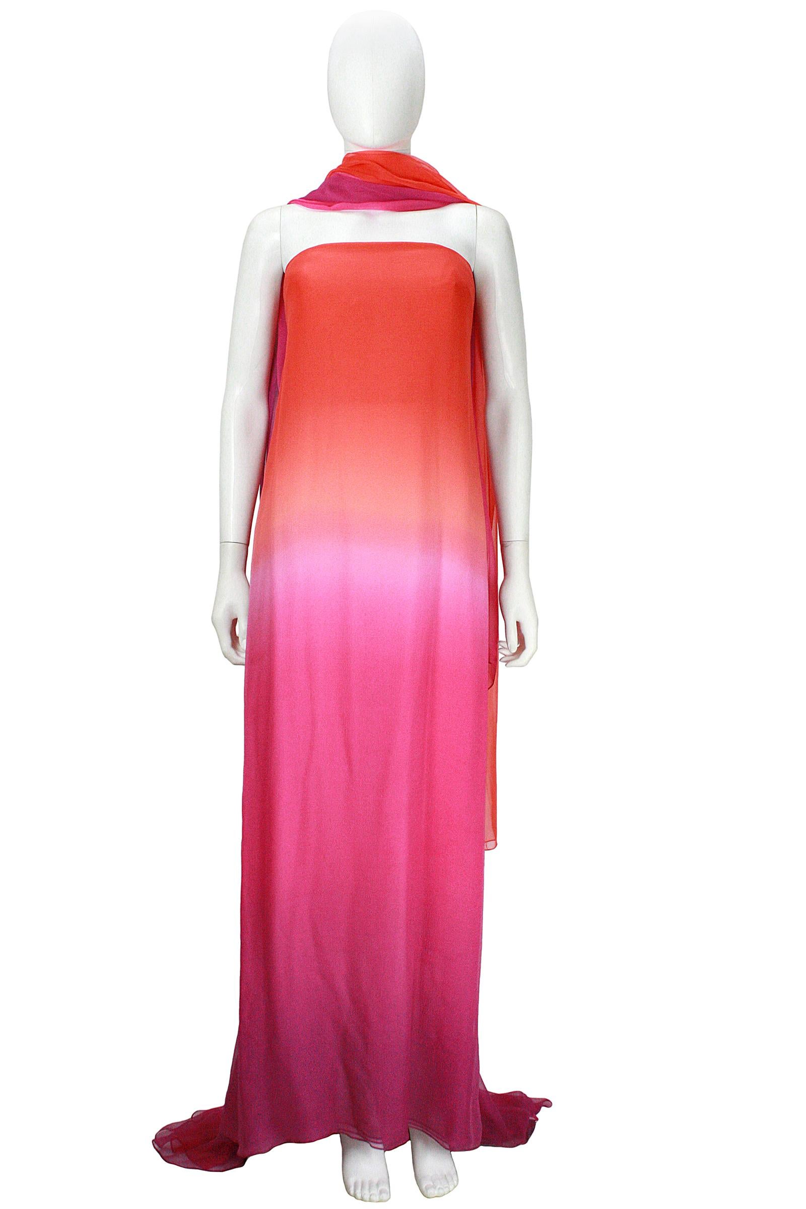 Oscar De La Renta gown 
Orange and pink ombre chiffon 
Strapless neckline with inner boning 
Cascading train 
Back invisible zipper and hook and eye 
Nude chiffon lining
Comes with chiffon wrap 
Made in USA