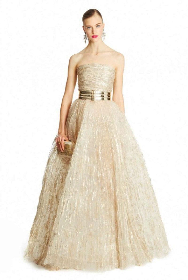 New Oscar De La Renta Champagne Tulle Painted Dress Gown
P/Fall 2015 Collection
Designer size - 8
Simply Beautiful and Classy!!! Champagne Color, Plisse Tulle Finished with Soft Gold Painting, Gathered Top, Build-in Corset, Skirt Layered for