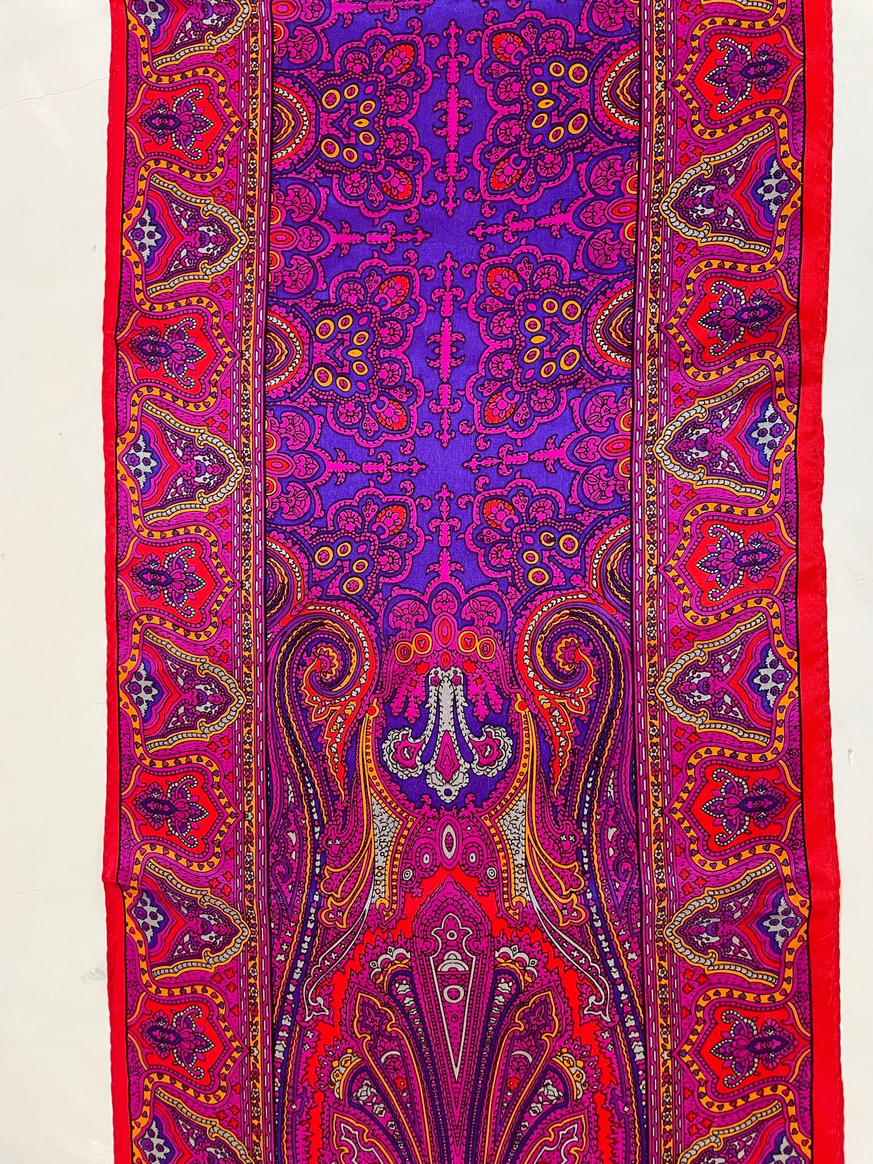 Oscar de La Renta Paisley Silk Oblong Scarf in Reds and Fuchsia.
Oscar de La Renta paisley silk oblong scarf in reds and fuchsia. This beautiful scarf is long and wide and self fringe at either end. Looks barely worn. Works as a perfect turban head