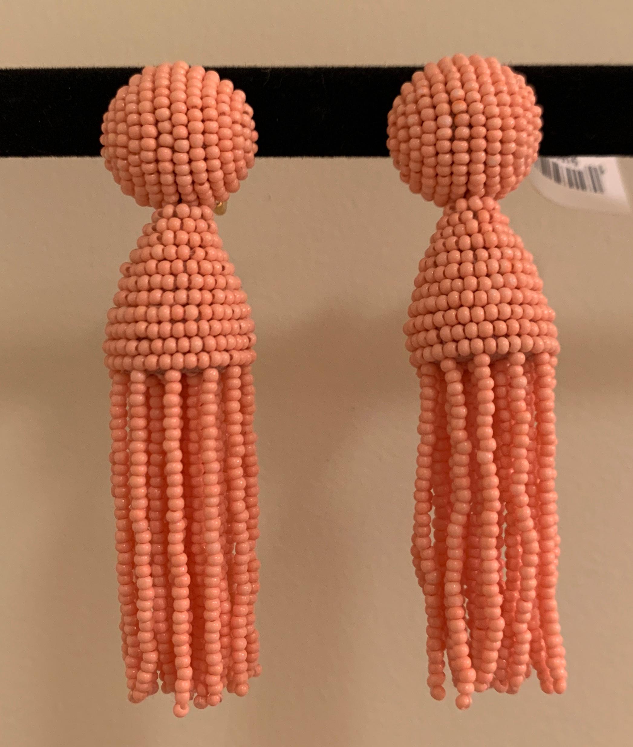 Oscar de la Renta peach pink beaded tassel earrings. Approximately 3 1/4