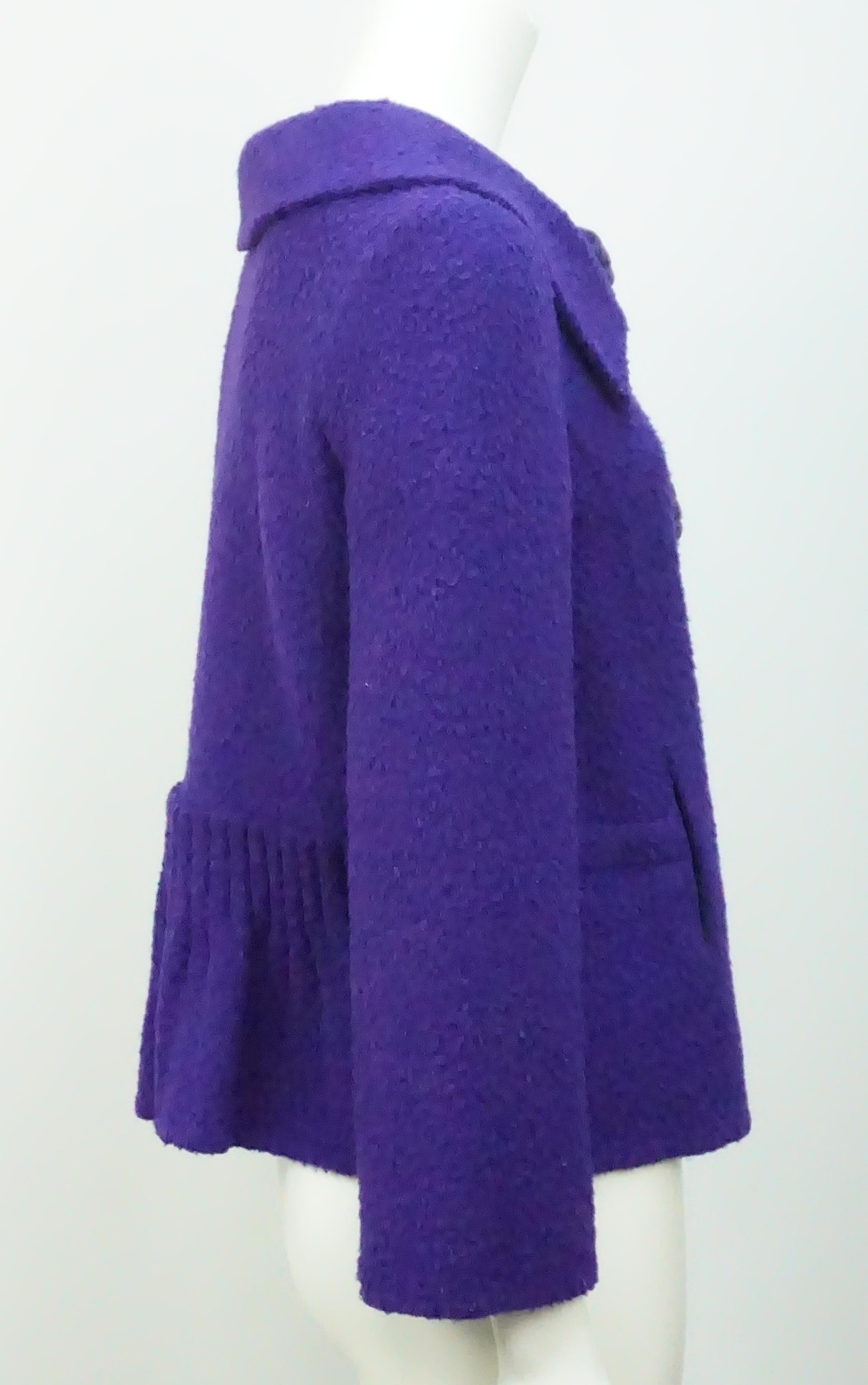 Oscar de la Renta Purple Alpaca Jacket with floral buttons-8. This beautiful jacket is a deep purple composed of wool and alpaca. It is in excellent condition. The jacket has three large buttons that have floral applique on them. It was released in