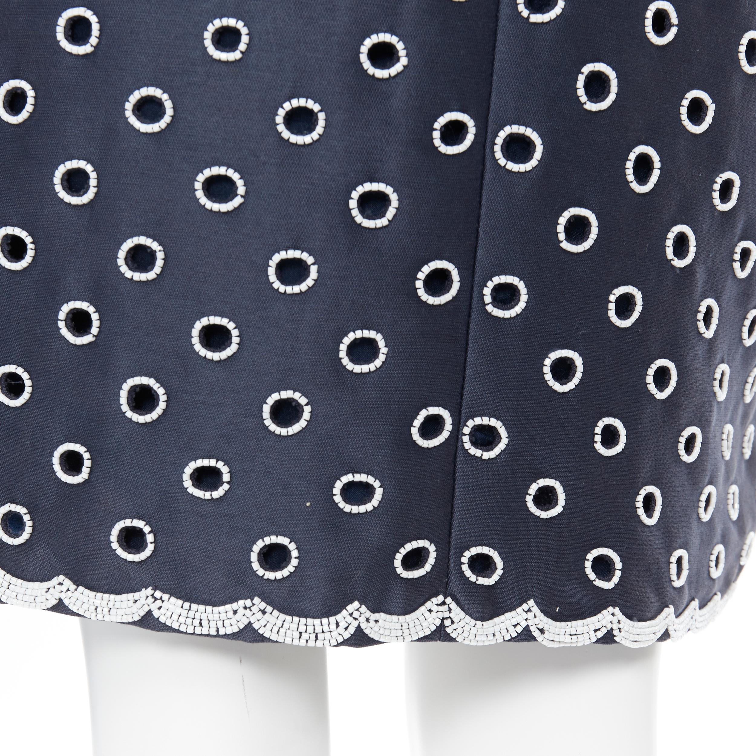 OSCAR DE LA RENTA R11 navy blue cotton white bead embroidered cut out skirt US0
Brand: Oscar de la Renta
Collection: R11
Model Name / Style: Pencil skirt
Material: Cotton blend
Color: Navy
Pattern: Polka dot
Closure: Zip
Extra Detail: Bead