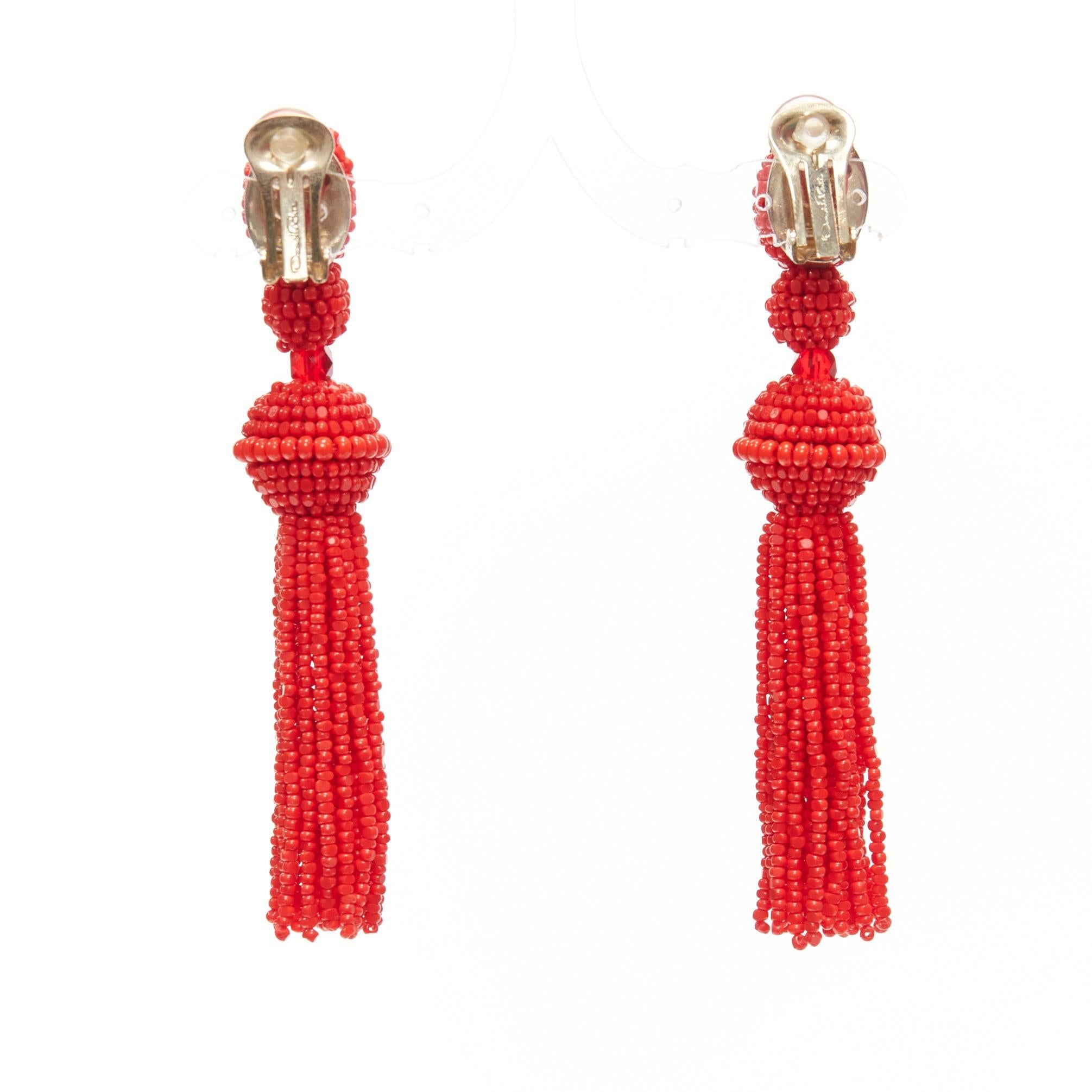 Women's OSCAR DE LA RENTA red beaded tassel dangling chandelier clip on earrings pair For Sale