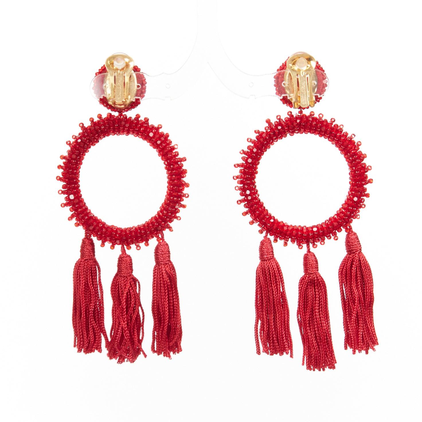 Women's OSCAR DE LA RENTA red beaded tassel fringe hoop dangling clip on earrings pair For Sale