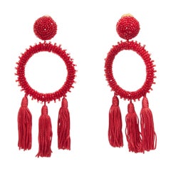 OSCAR DE LA RENTA red beaded tassel fringe hoop dangling clip on earrings pair OSCAR DE LA RENTA red beaded tassel fringe hoop dangling clip on earrings pair