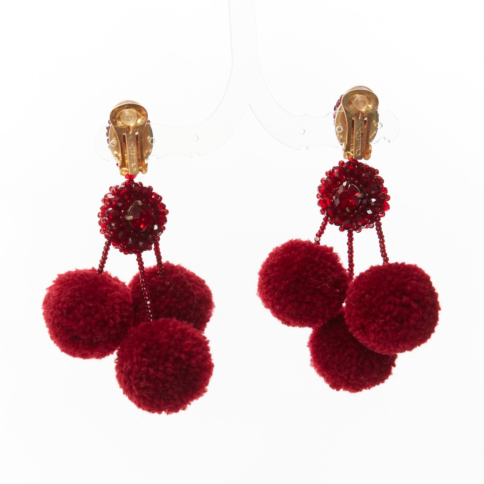 Women's OSCAR DE LA RENTA red pompom beads embellished dangling clip on earrings pair For Sale