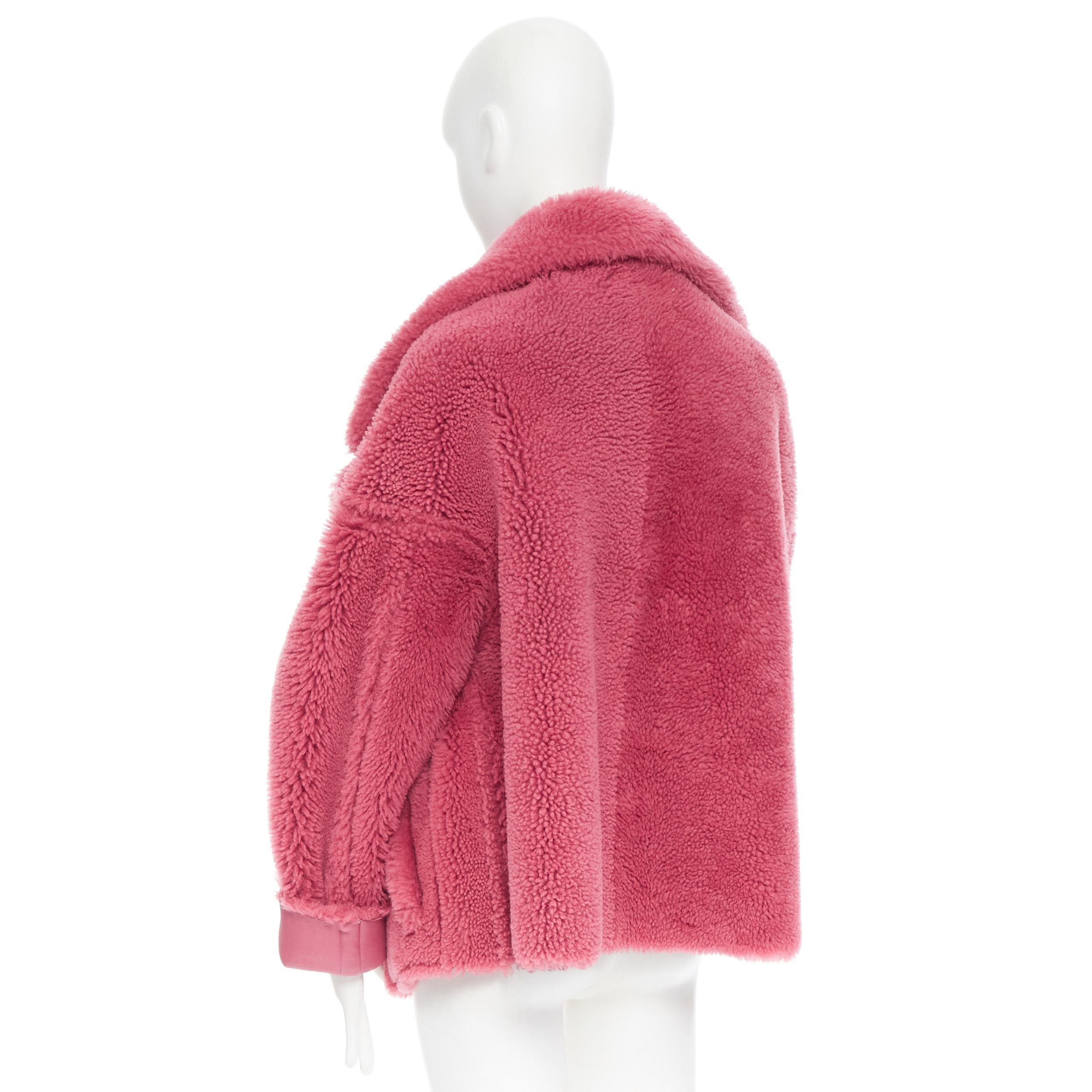 OSCAR DE LA RENTA reversible pink shearling leather oversized aviator coat 1