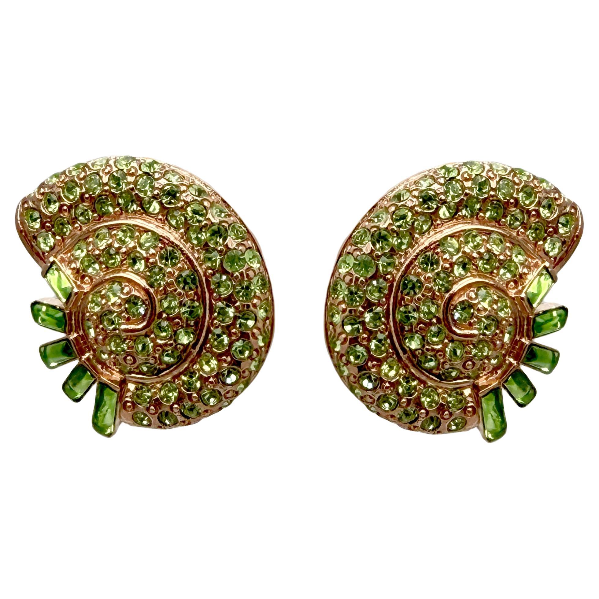 Oscar de la Renta Rose Gold Nautilus Clip-On Earrings with Peridot Crystals For Sale