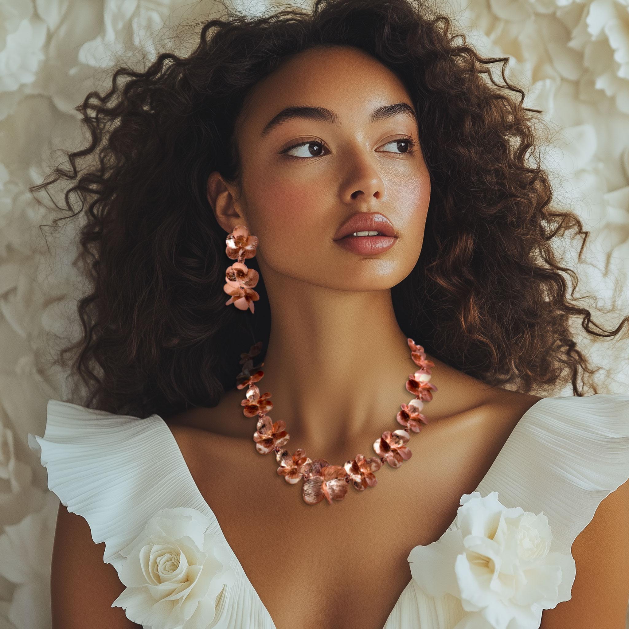 Oscar de la Renta rose gold pansy necklace featuring impressionistic floral design with delicate textured motifs, 16-inch length with 4-inch extender, substantial 115-gram weight.

This exquisite Oscar de la Renta necklace showcases the designer's