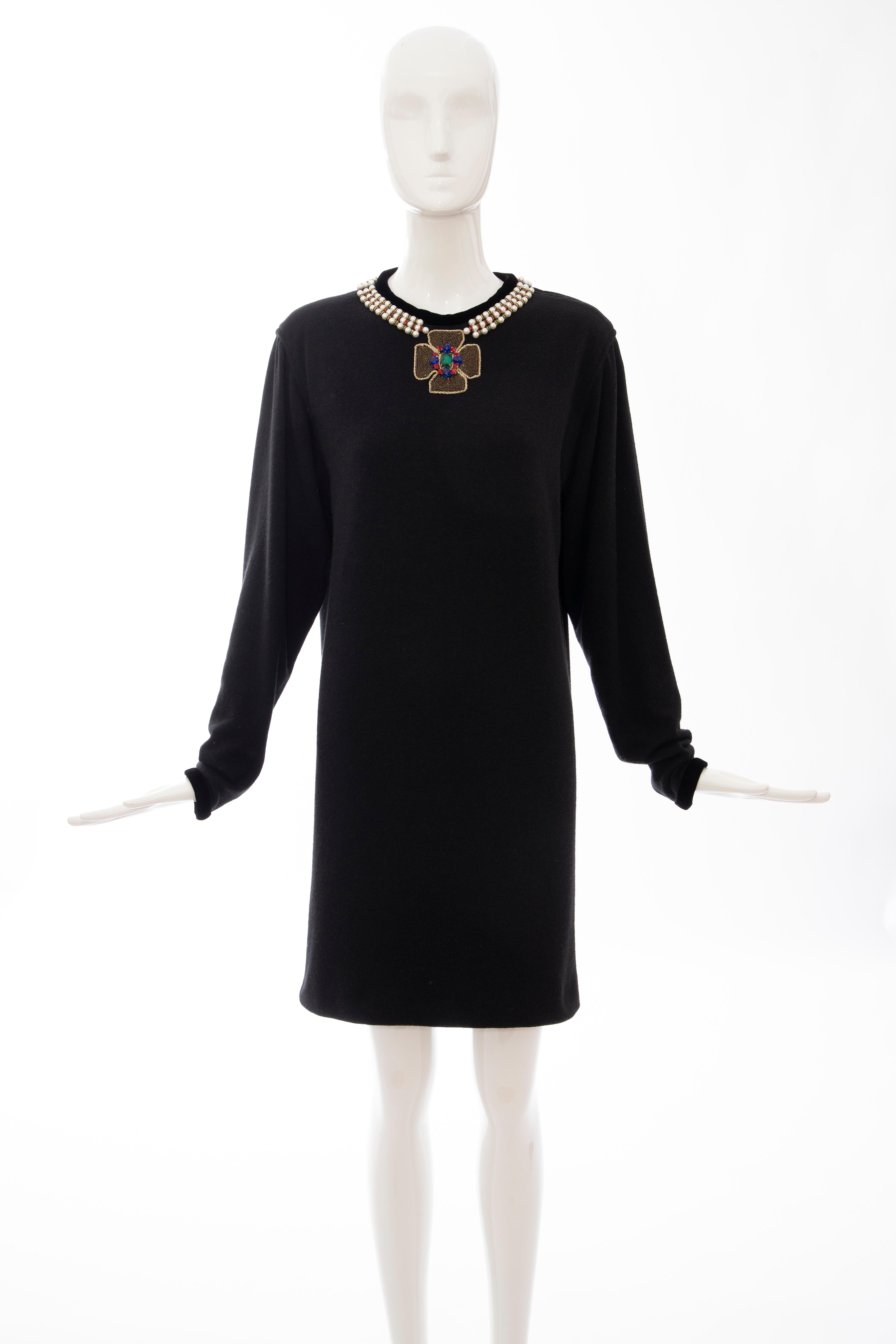 Oscar de la Renta, Runway Fall 1984, black wool sweater dress with pearl & rondelle spacer  glass rhinestones embroidered neckline, black velvet trim crew neck and sleeve detail with zip closure at shoulder and fully lined in black silk.

US.