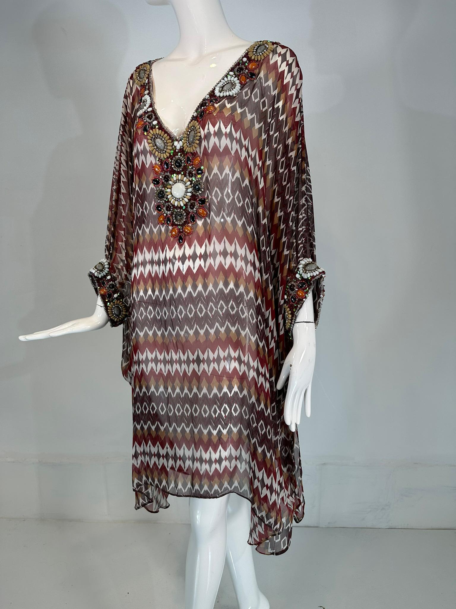 Oscar de la Renta s/s 2008 silk beaded, jewel neck & cuffs tunic caftan S/M. russet, caramel, white brown geometric ethnic design silk caftan with a Deep V neckline & elbow length jewel band cuffs. 
The bead work is extensive cabochons in white,