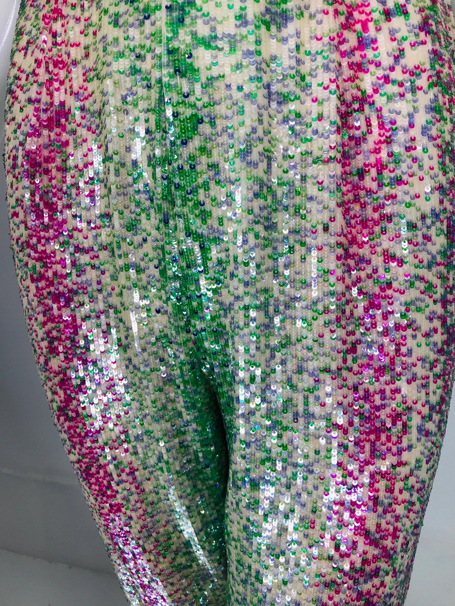 Oscar de la Renta sequin & silk narrow leg trouser in magenta, blue, green, pink & iridescent mini sequins. Marked size 8, fits like a 4 small. No band waist, closes at the back with a zipper and hook & eye at the waist. Sequins sewn on silk, lined