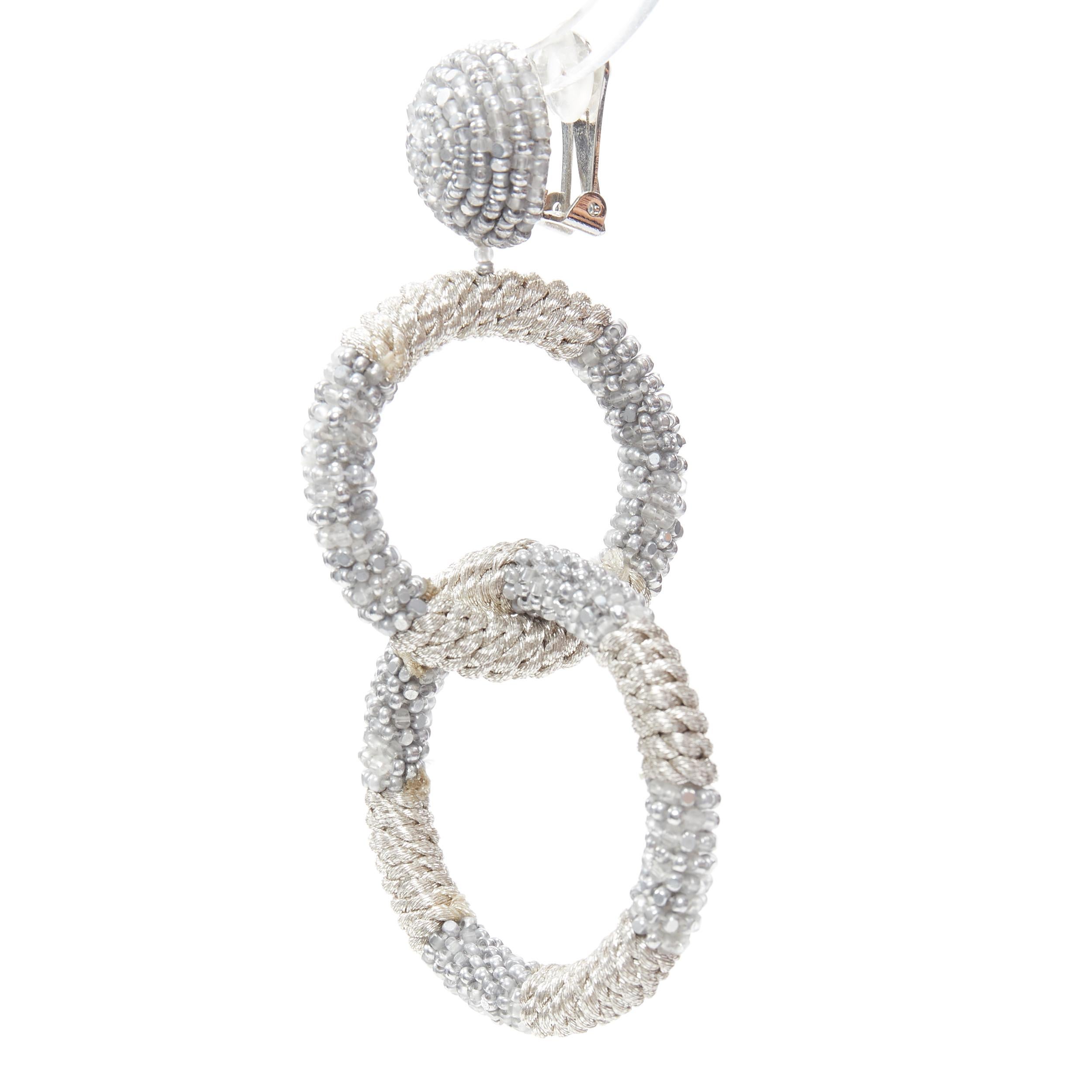 Women's OSCAR DE LA RENTA silver bead embellished dual hoop clip on statement earring