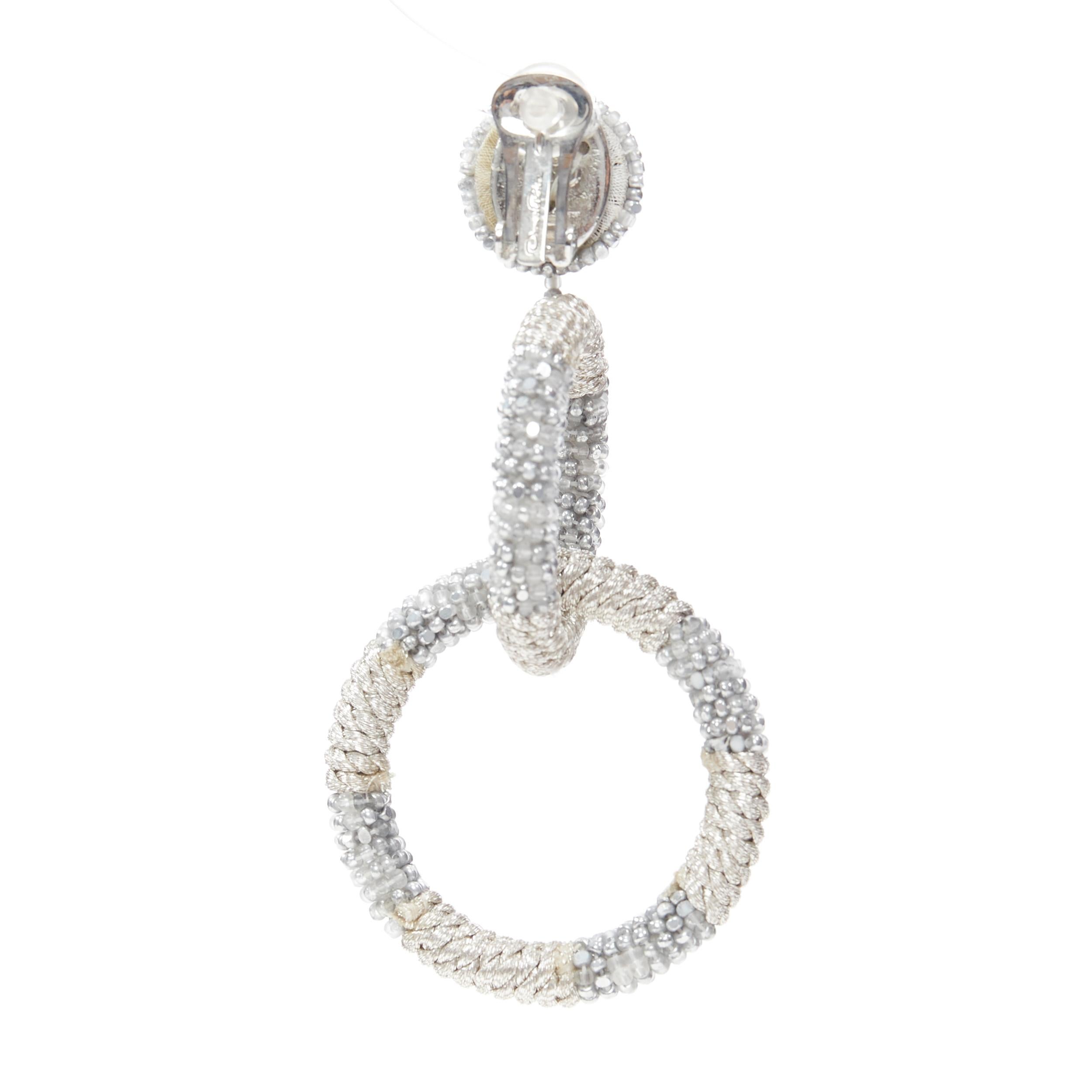 OSCAR DE LA RENTA silver bead embellished dual hoop clip on statement earring 1