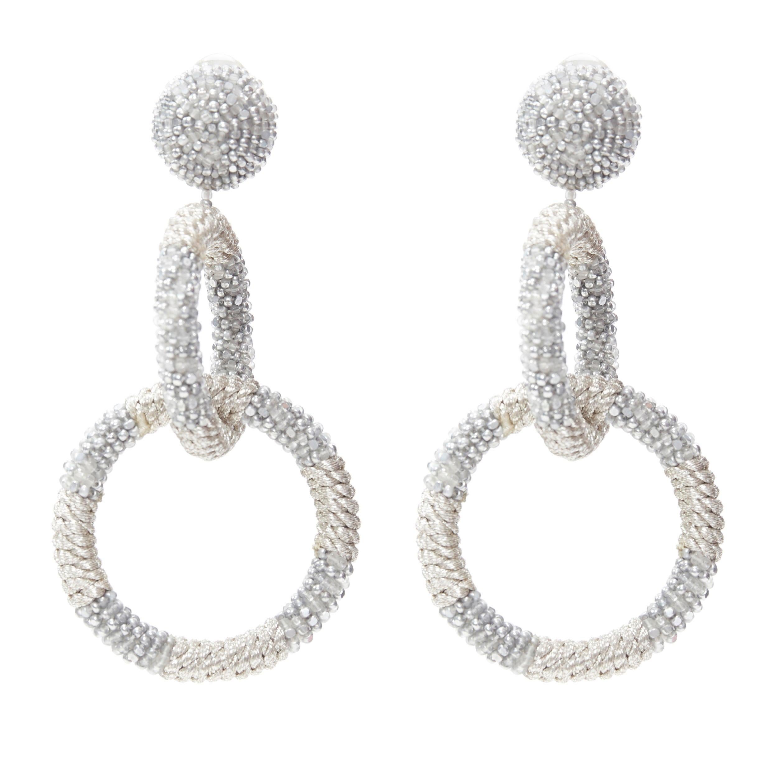 OSCAR DE LA RENTA silver bead embellished dual hoop clip on statement earring