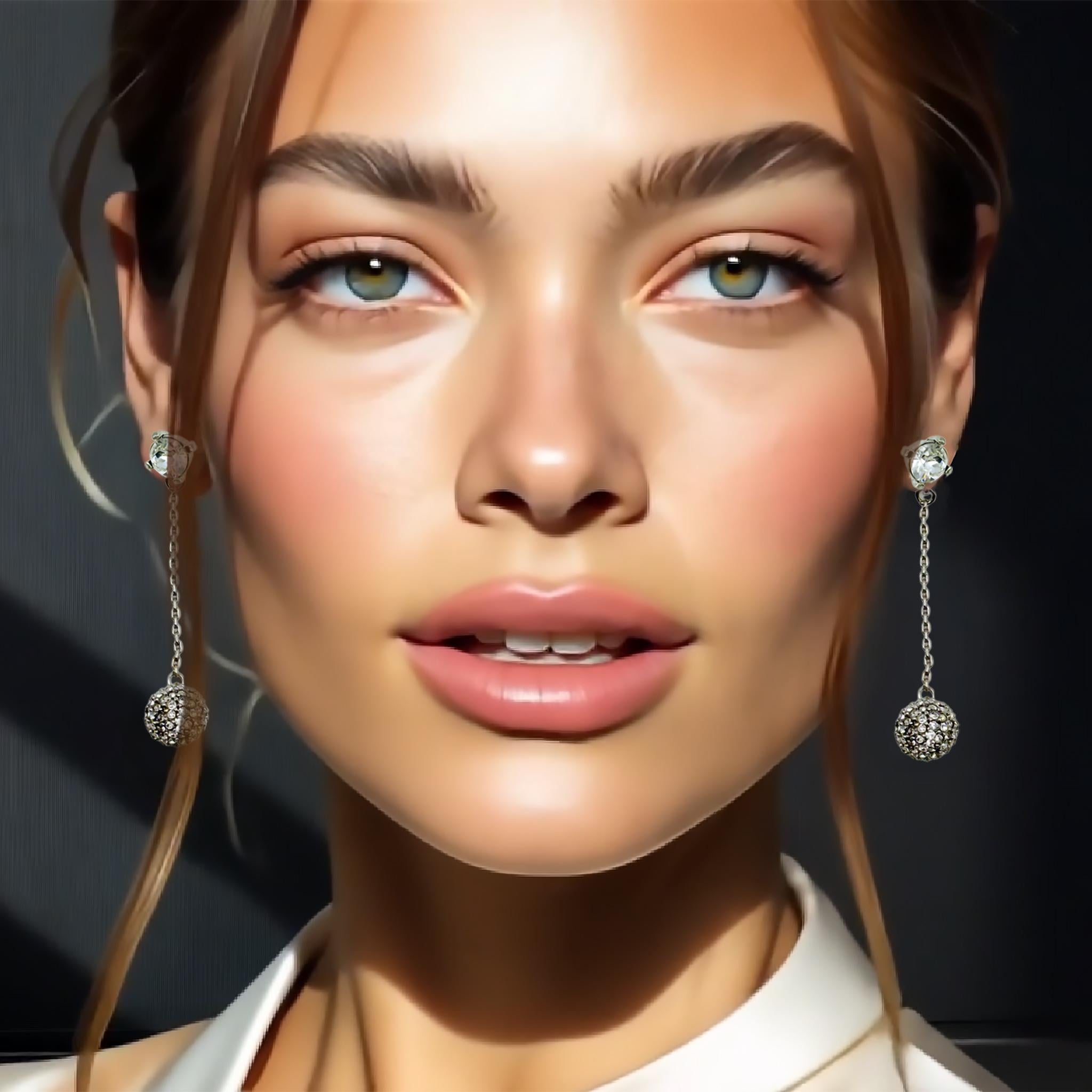 Oscar de la Renta silver-tone crystal pavé ball post drop earrings present a refined Contemporary statement in luxury fashion jewelry. Signed “Made in USA” and “Oscar de la Renta,” these 2014 post-back earrings feature a front-to-back design: a