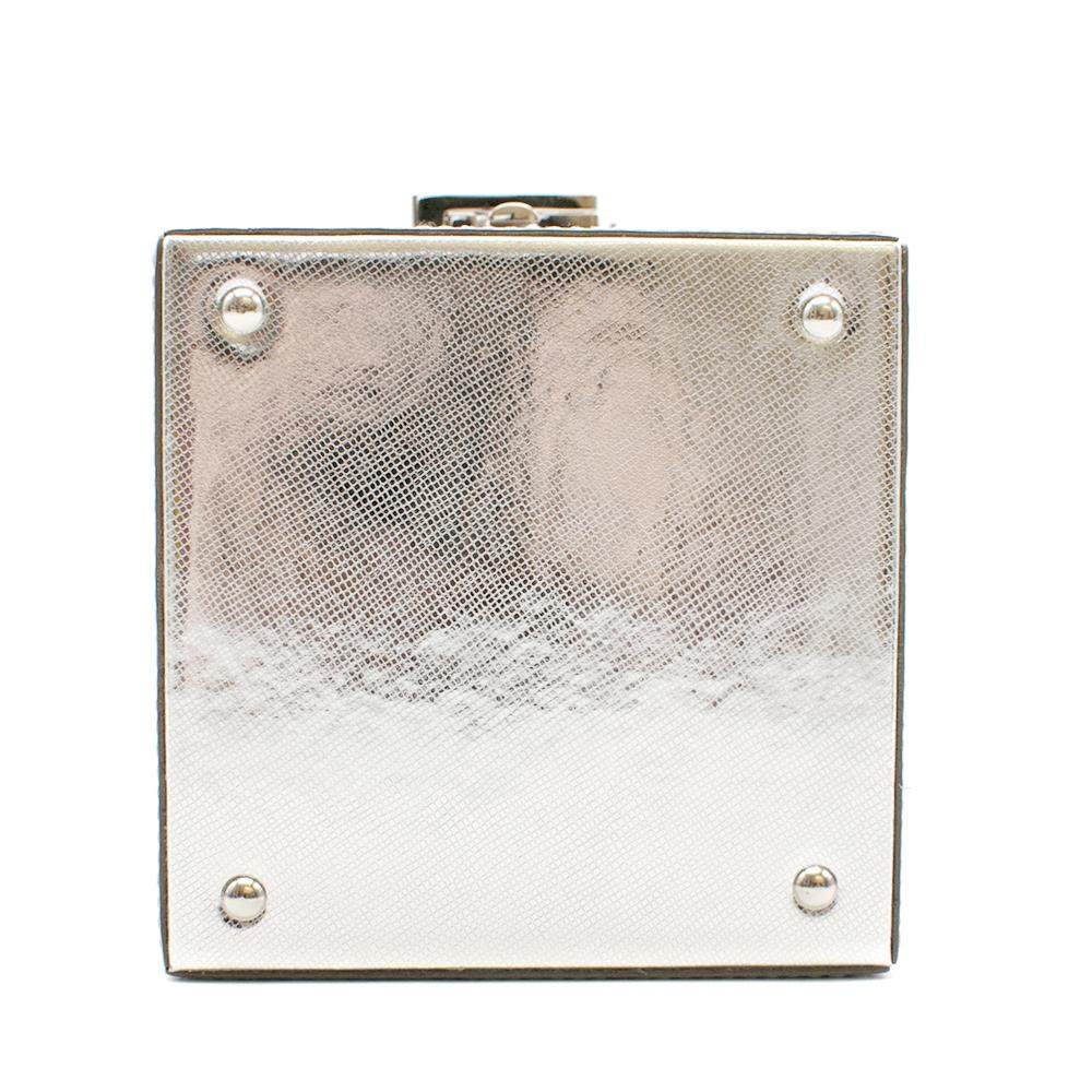 Silver calf leather mini Alibi top handle box bag from Oscar de la Renta featuring silver-tone hardware, an engraved logo, a clasp fastening, a main compartment inside, removable and interchangeable fish and turtle charms.

Please note, these items
