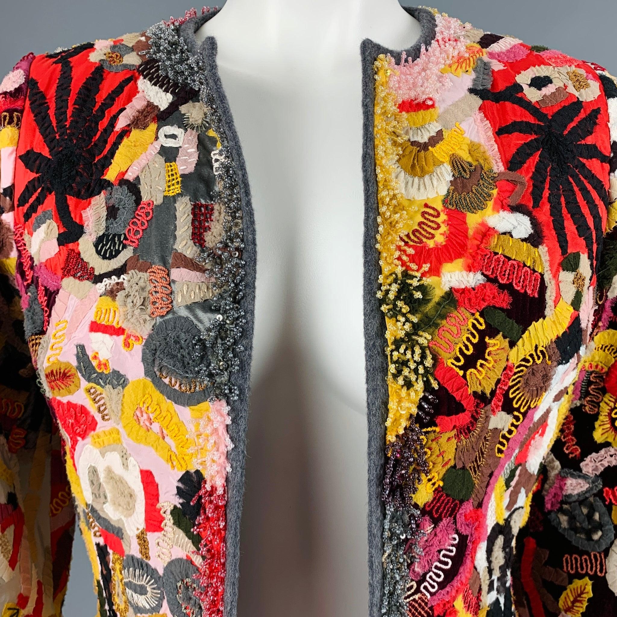 OSCAR DE LA RENTA jacket
in a yellow and red virgin wool blend fabric with velvet rayon silk lining, featuring vibrant eclectic abstract pattern, colorful ribbon details, beaded trim, and open front. Made in USA.Excellent Pre-Owned Condition.