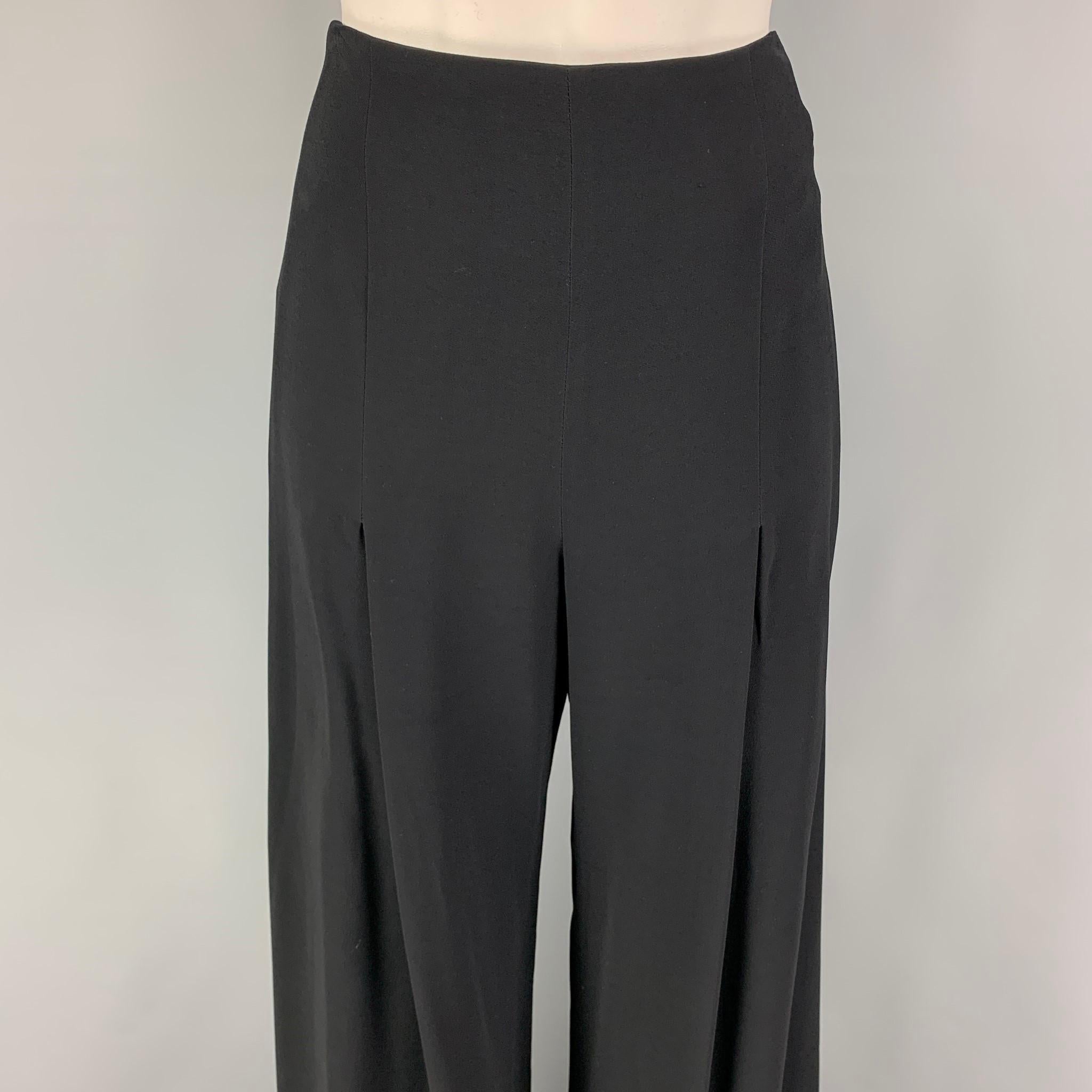 OSCAR DE LA RENTA dress pants comes in a black viscose featuring a wide leg style, pleated design, high waisted, and a side zipper closure. 

Very Good Pre-Owned Condition.
Marked: 8

Measurements:

Waist: 30 in.
Rise: 12.5 in.
Inseam: 36 in.
Leg