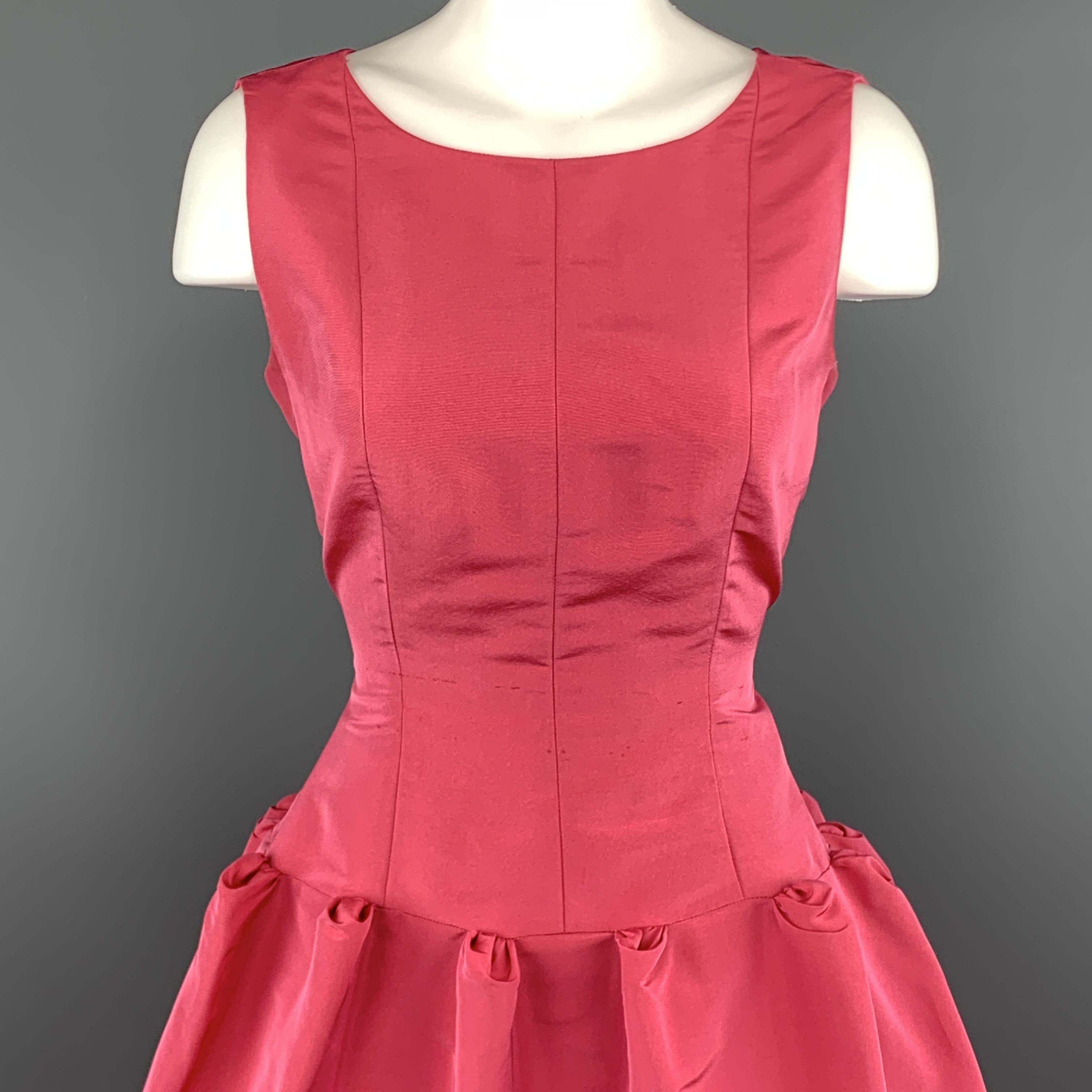 Vintage OSCAR DE LA RENTA cocktail dress comes in pink faille and features a sleeveless, fitted bodice and structures drop waist skirt with cascading structured gather pleat ruffles. Famously worn in the final season of Sex & the City by Carrie