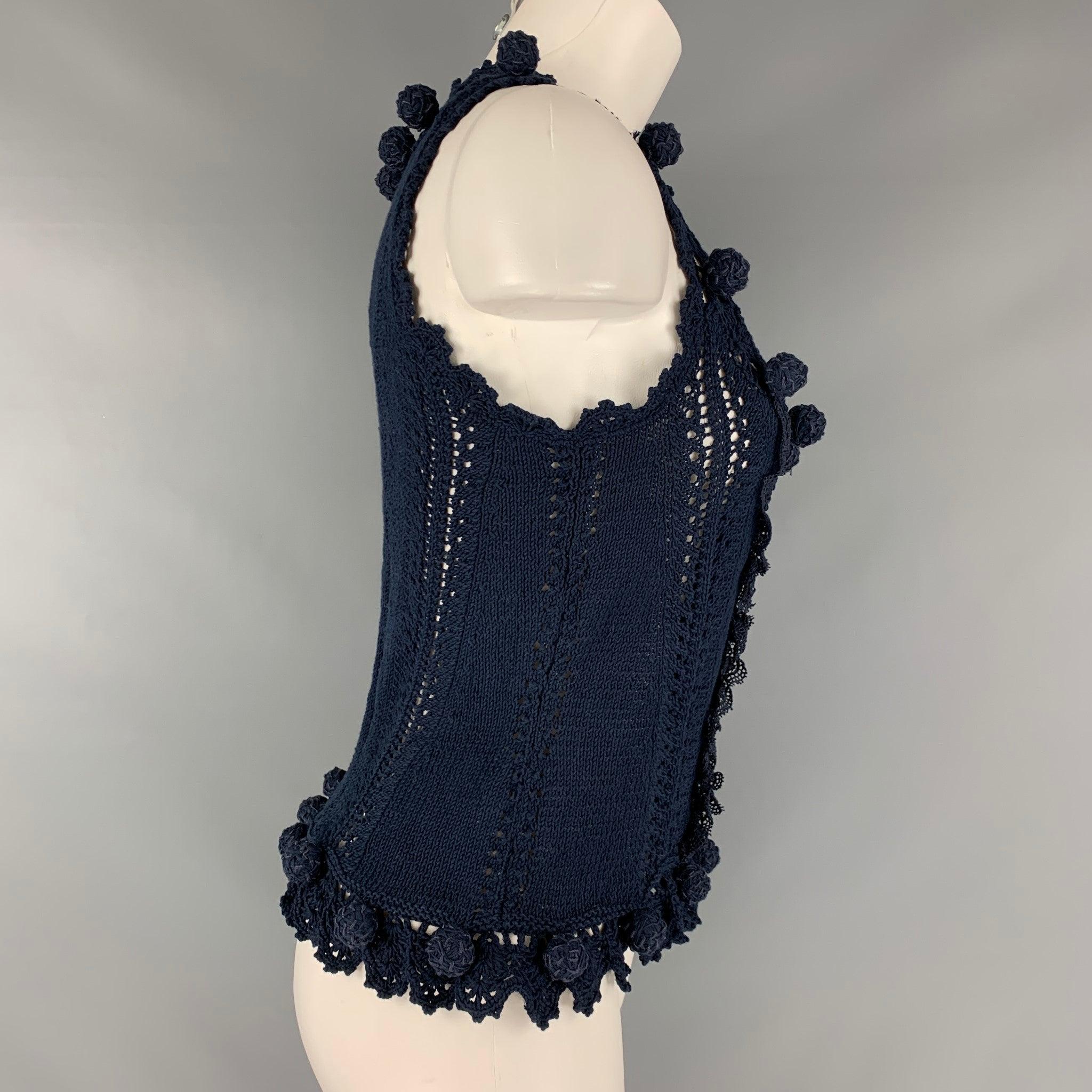 OSCAR DE LA RENTA tank to comes in a navy cotton crochet featuring ribbon embellishments. Excellent Pre-Owned Condition.
 

Marked:   M 

Measurements: 
 
Shoulder: 10 inches Bust: 32 inches Length: 20 inches  
  
  
 
Reference: 126946
Category: