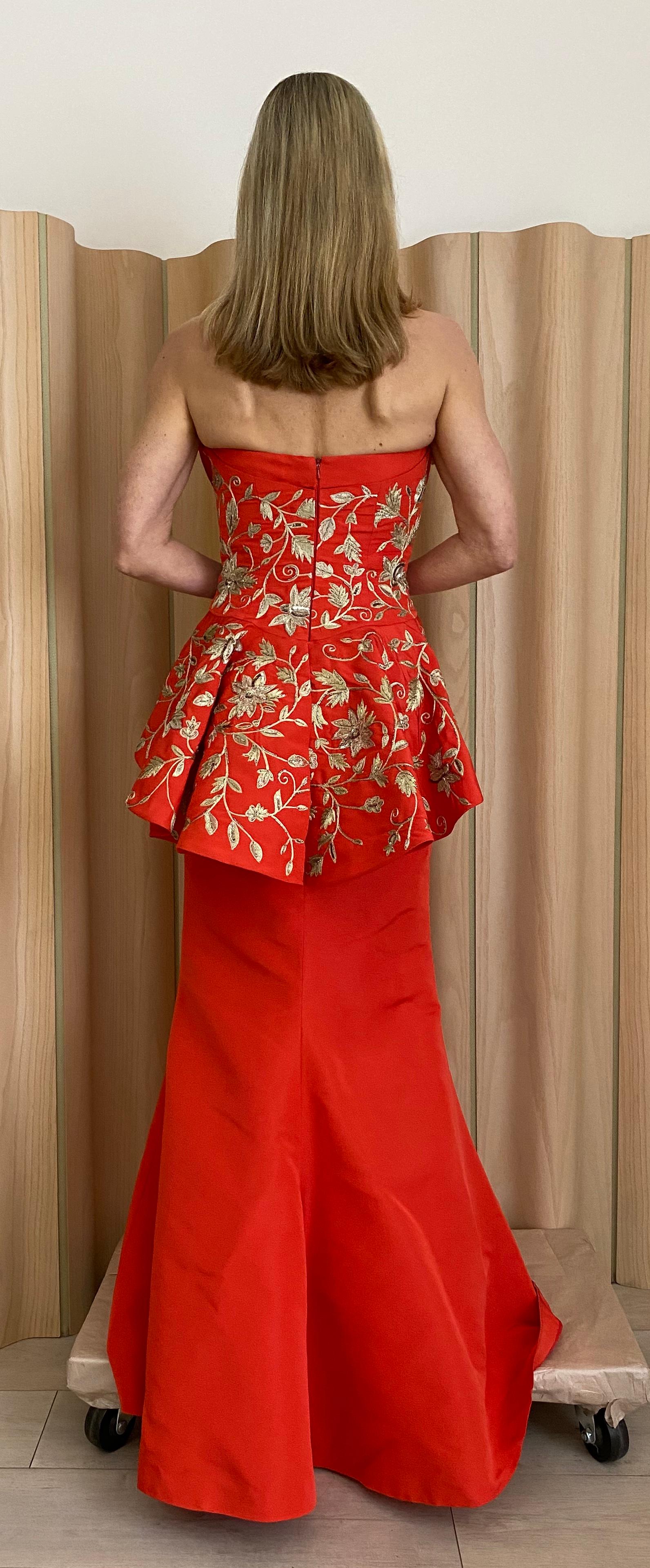2015 Oscar De La Renta Strapless Tangerine Red Silk Peplum Gown with metallic silk embroidery.
Gown is in excellent condition. Marked size : 6 but fit small 4 ( see measurement)
Measurement: 
Bust : 30” / Waist: 26” / Hip : 36” / Front length 52”/
