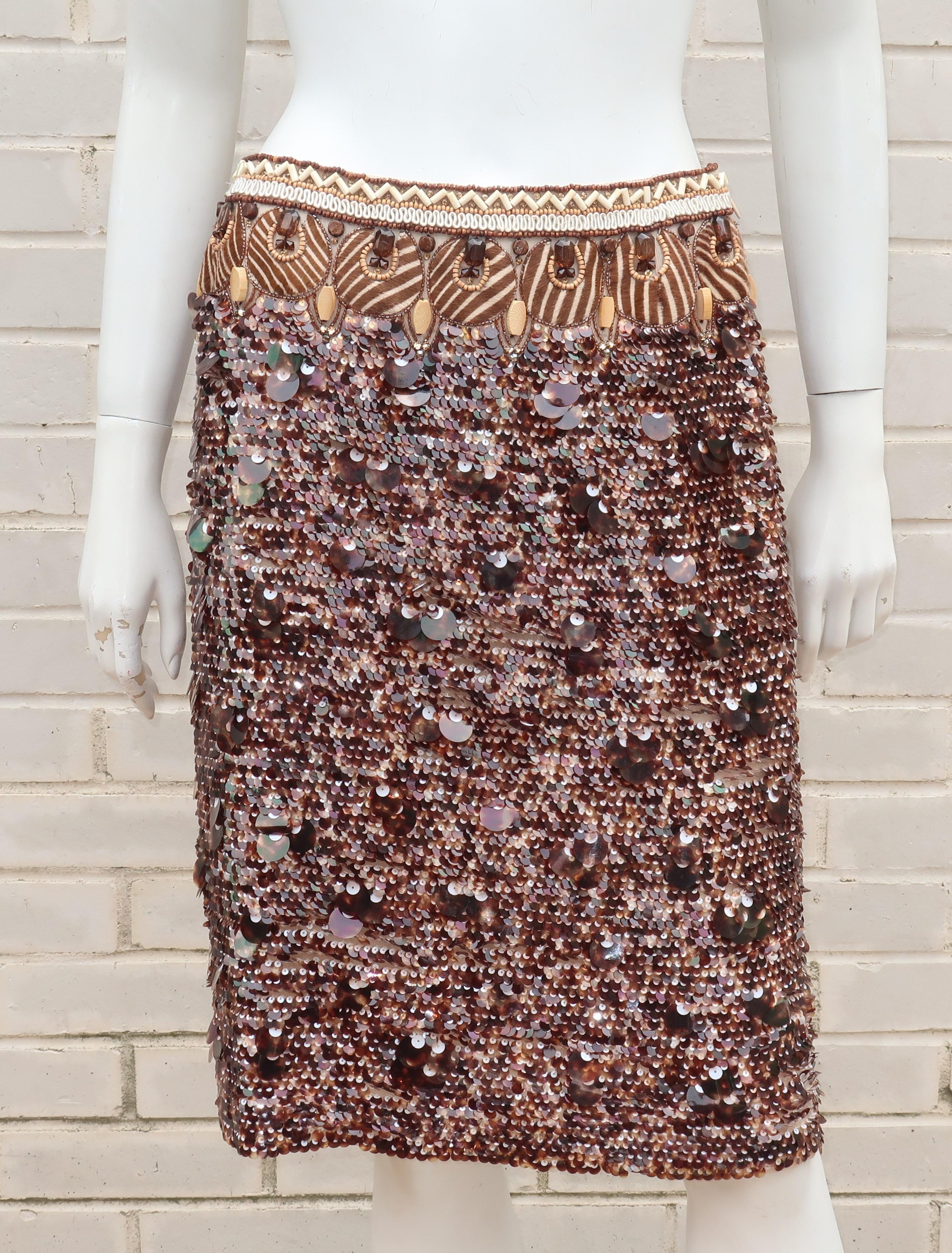 Channel your inner wild child with this fully embellished Oscar de la Renta sequin skirt.  The exotic motif includes sequins in a faux tortoise brown mixed with white topped off by a waistband decoration incorporating faux animal print fur, wooden