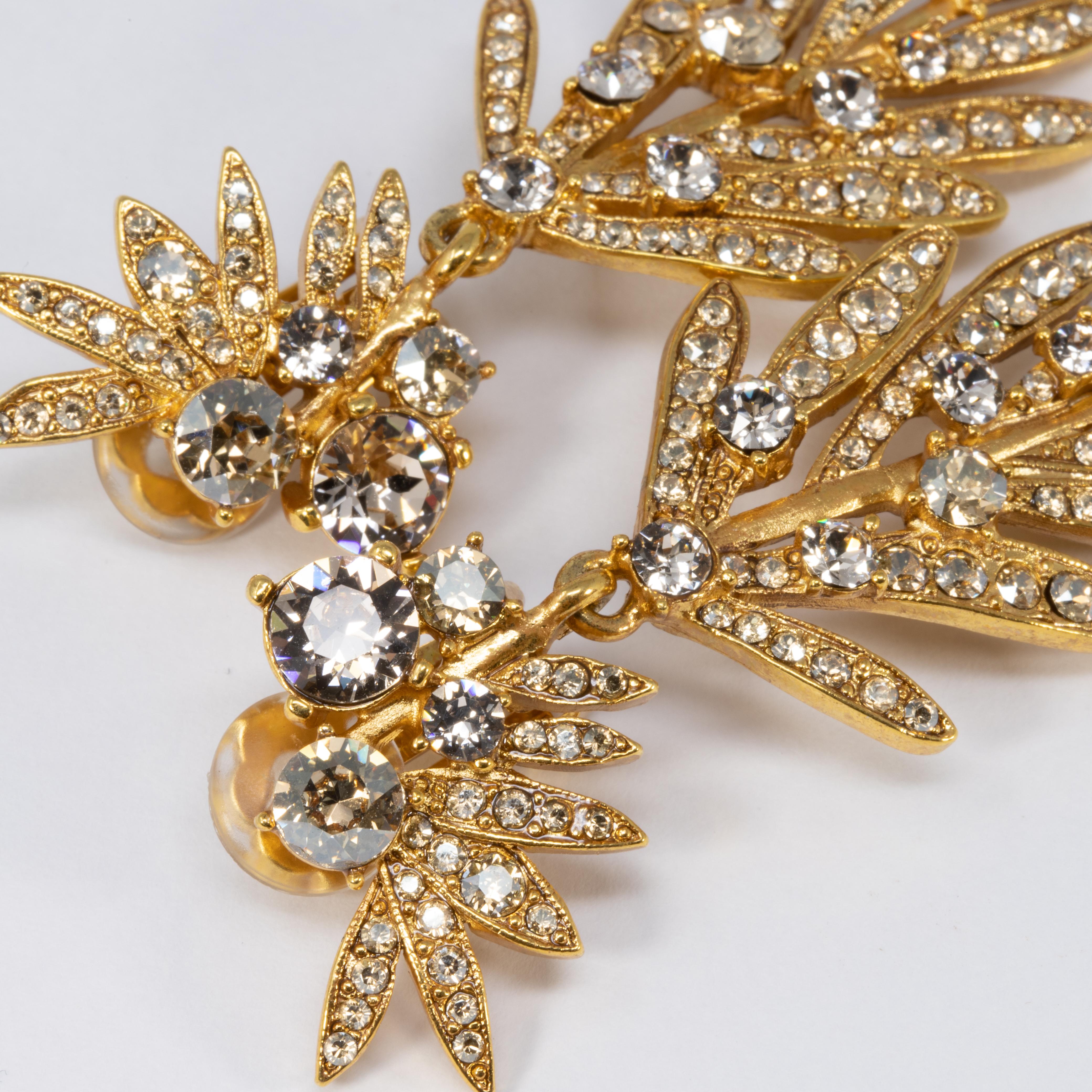 Contemporary Oscar de la Renta Tropical Leaf Clear Crystal Dangling Clip On Earrings, In Gold
